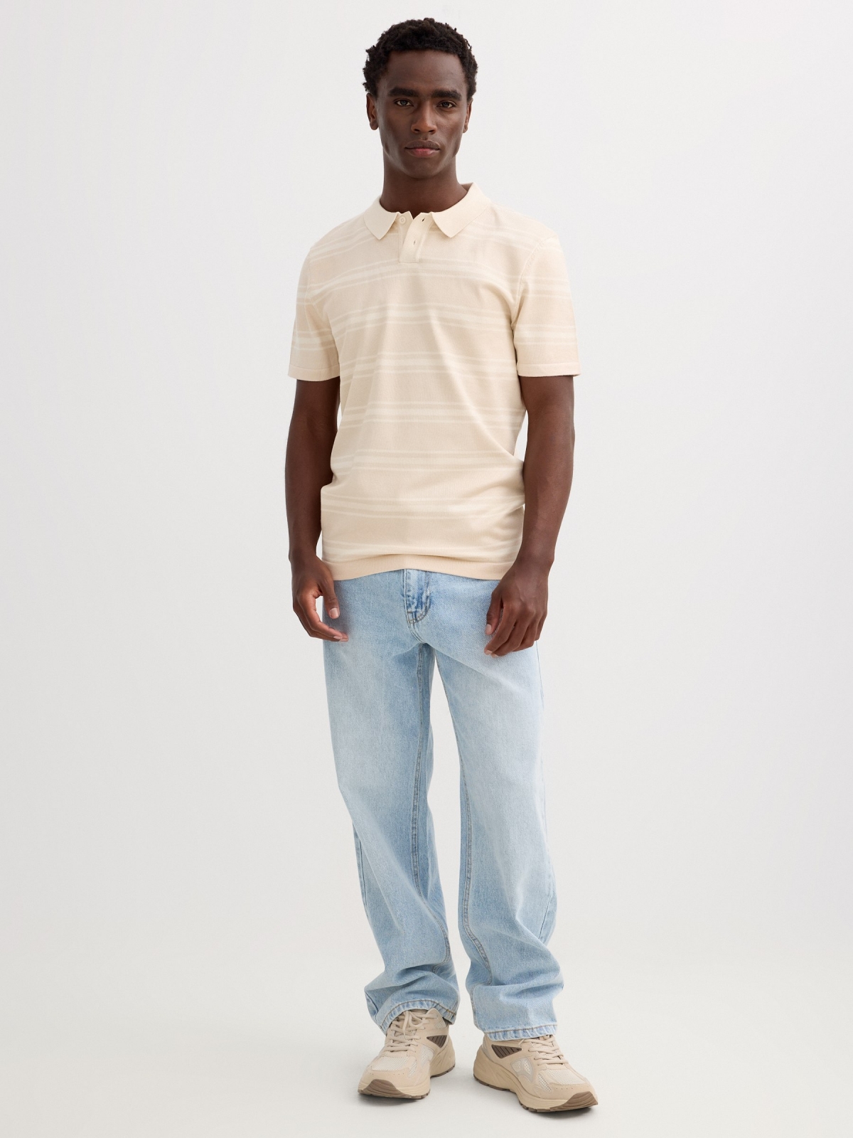 Striped knit polo shirt with buttons raw front view