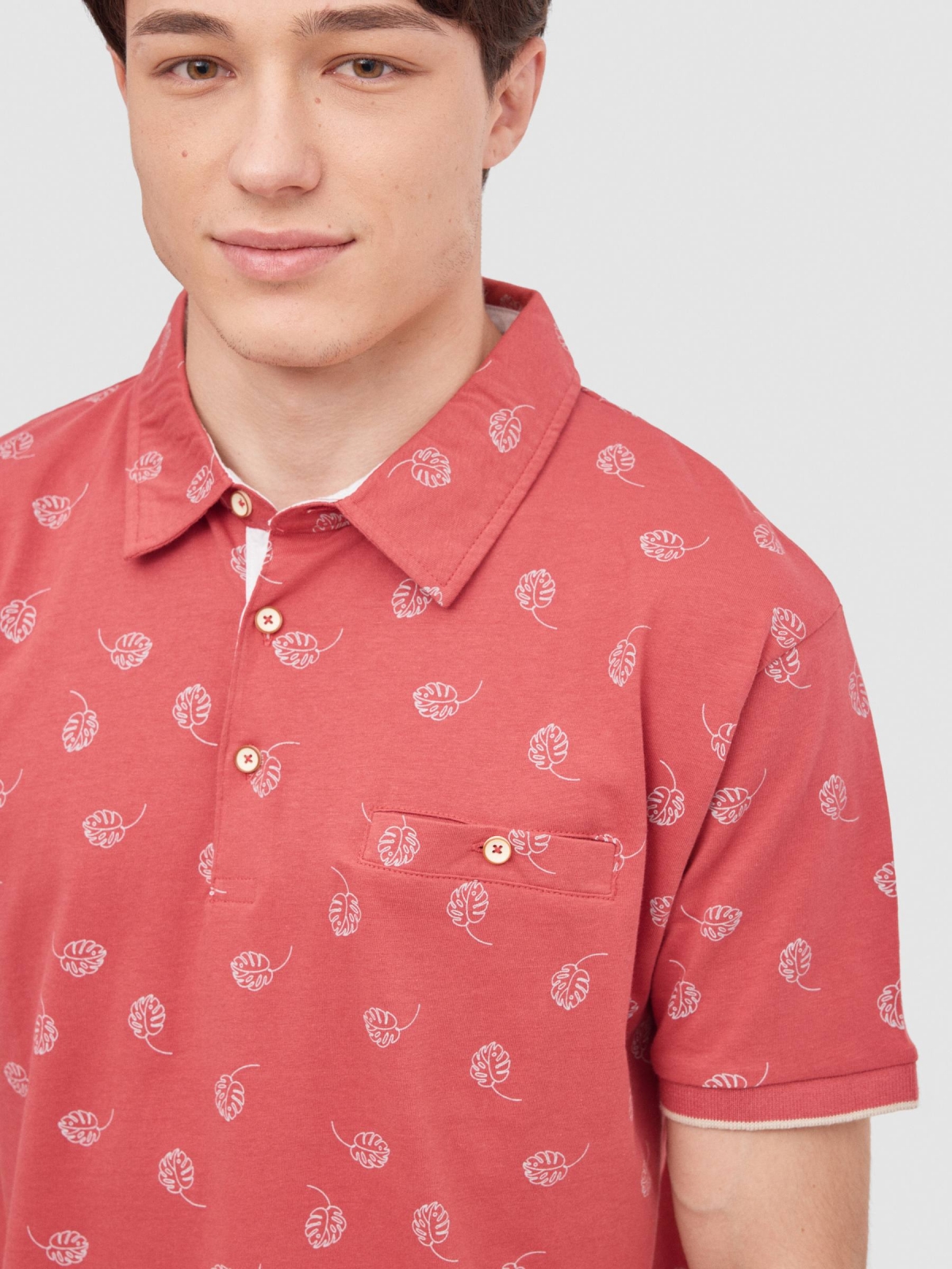 Tropical print polo red detail view