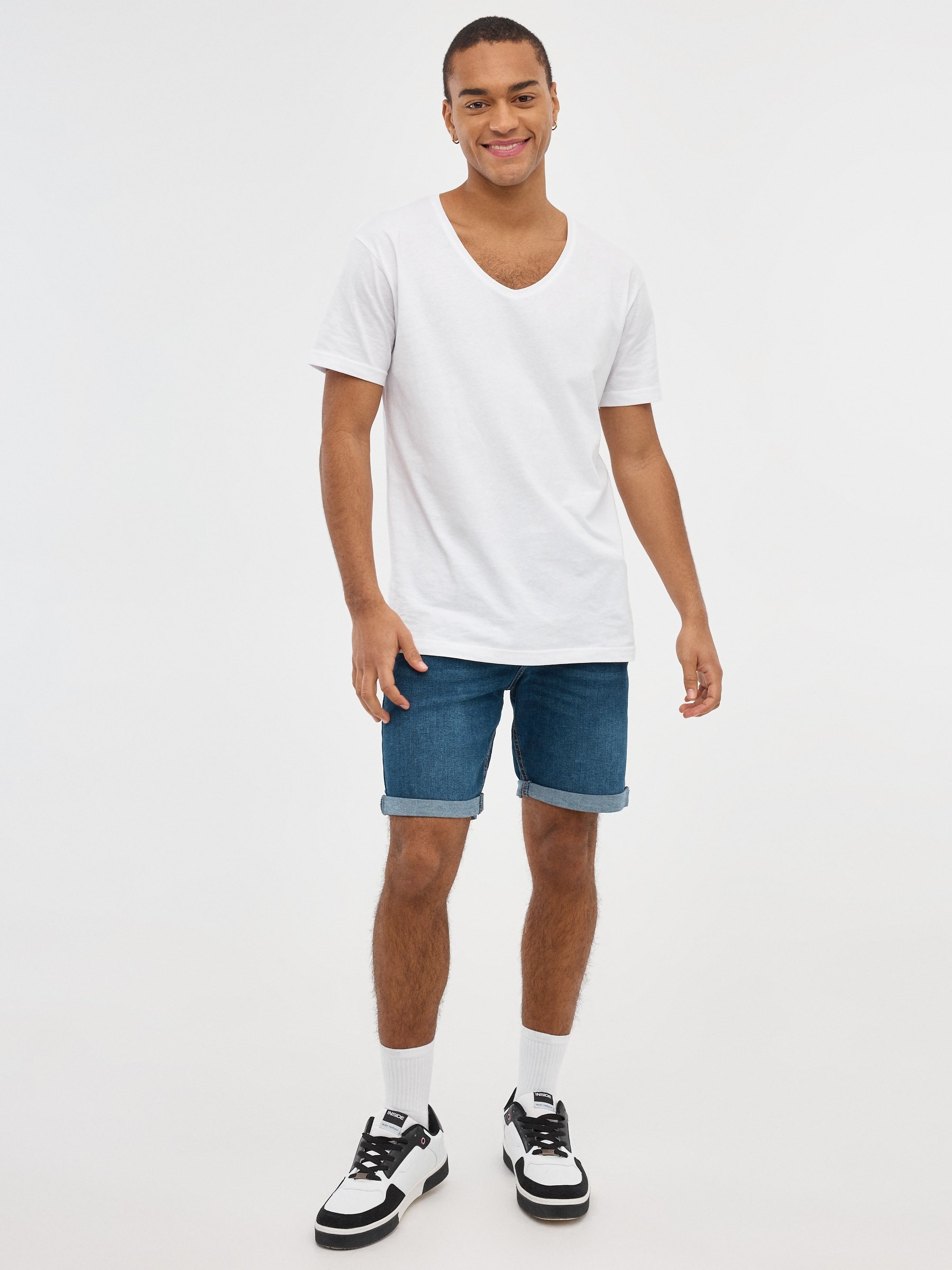 Frayed ripped denim Bermuda shorts blue middle front view