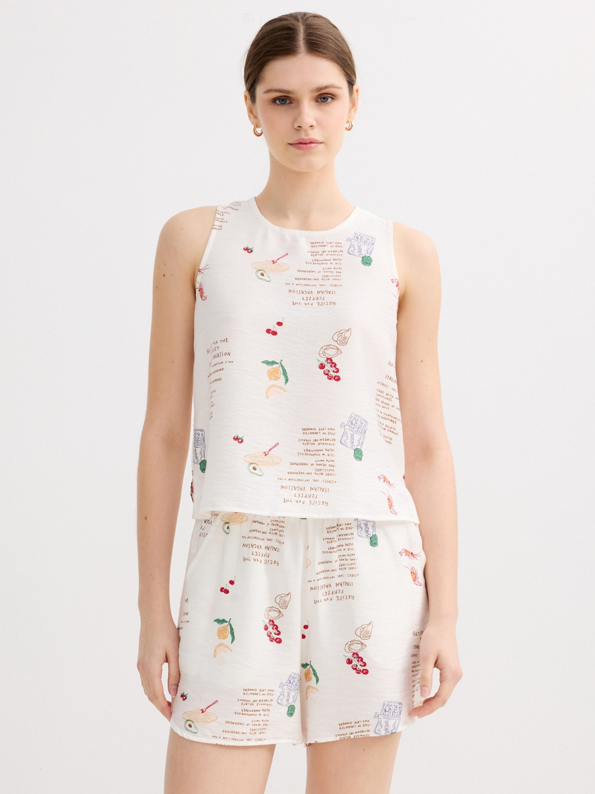 Blusa estampada sem mangas branco vista meia frontal