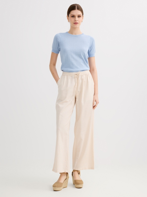 Fluid high-waisted linen pants beige front view
