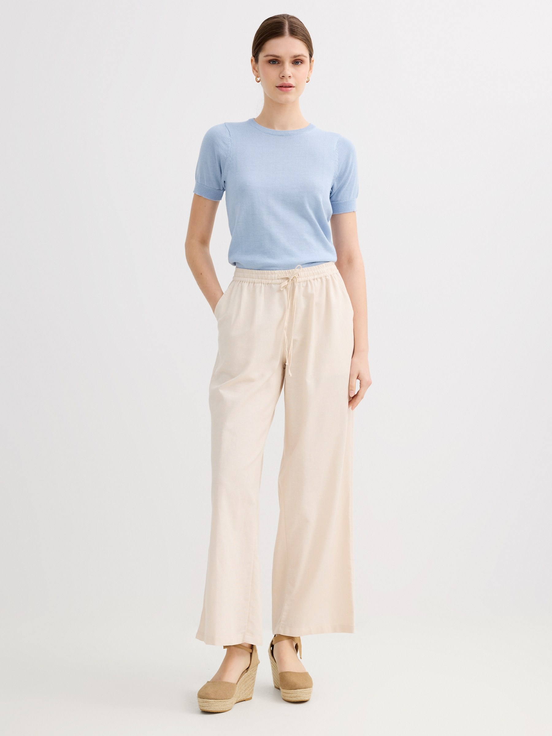Fluid high-waisted linen pants beige front view
