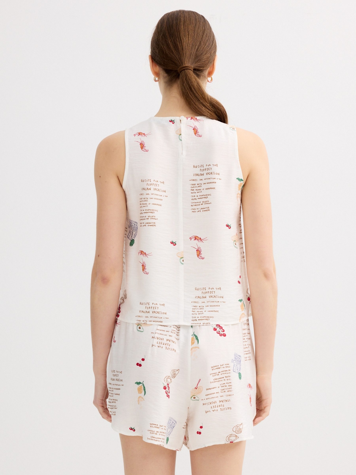 Blusa estampada sin mangas blanco vista media trasera