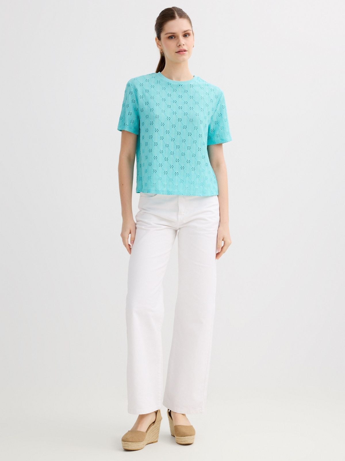 Swiss embroidered openwork T-shirt light blue front view