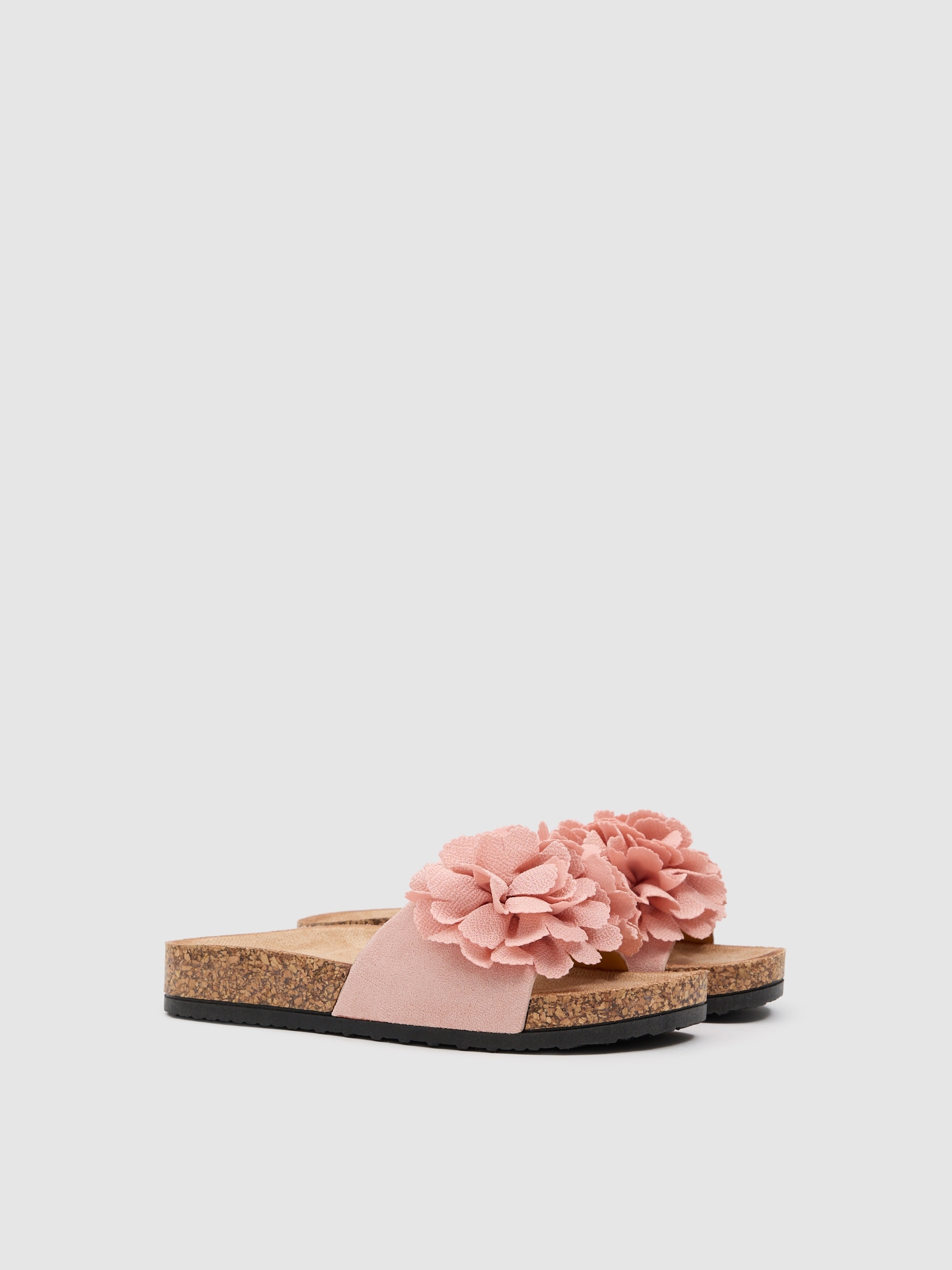 Sandalia pompon efecto piel rosa