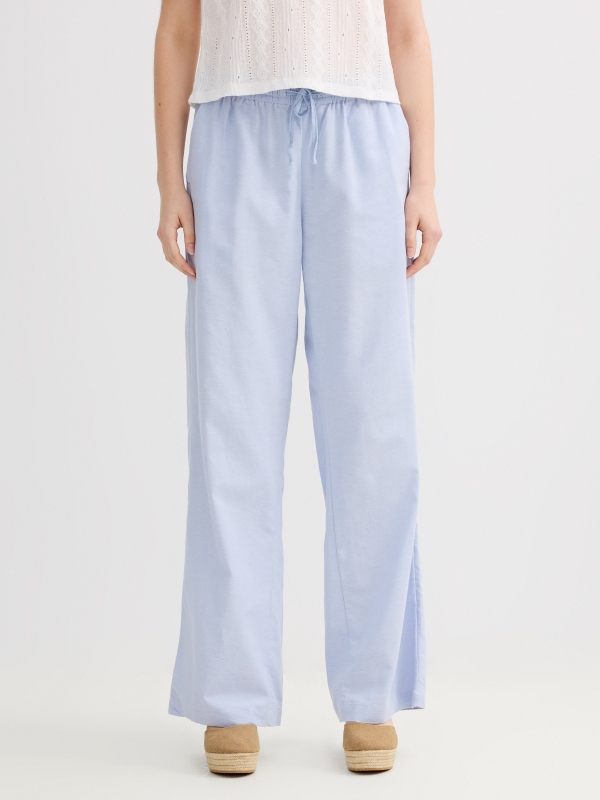 Fluid high-waisted linen pants light blue middle front view