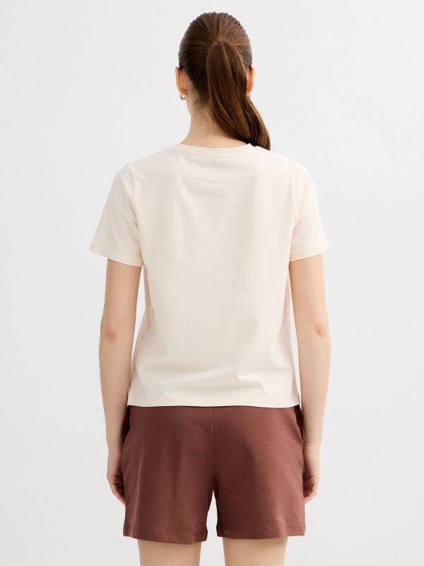 Camiseta estampada tropical off white vista meia traseira