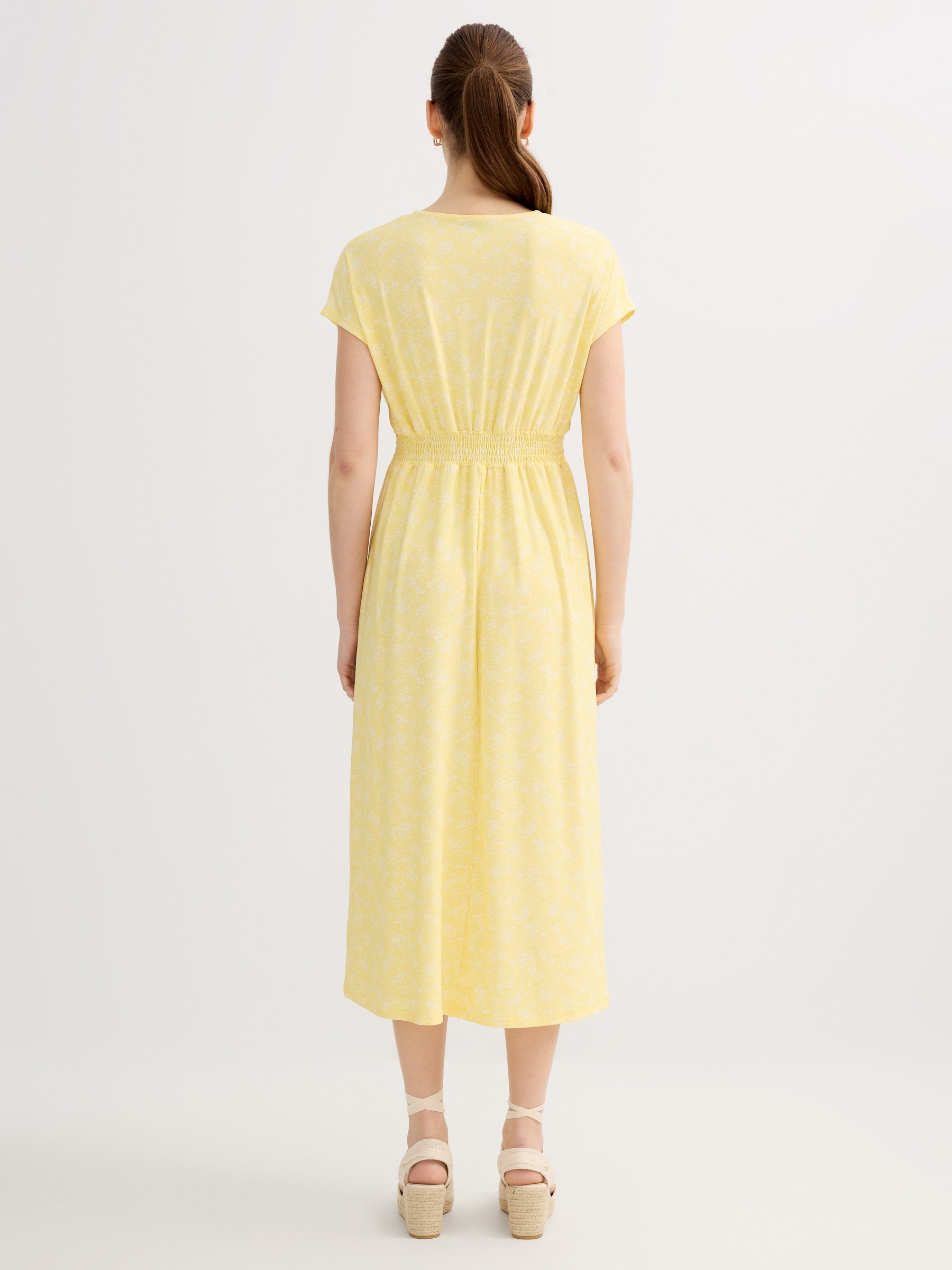 Vestido midi flores nido abeja amarillo vista media frontal