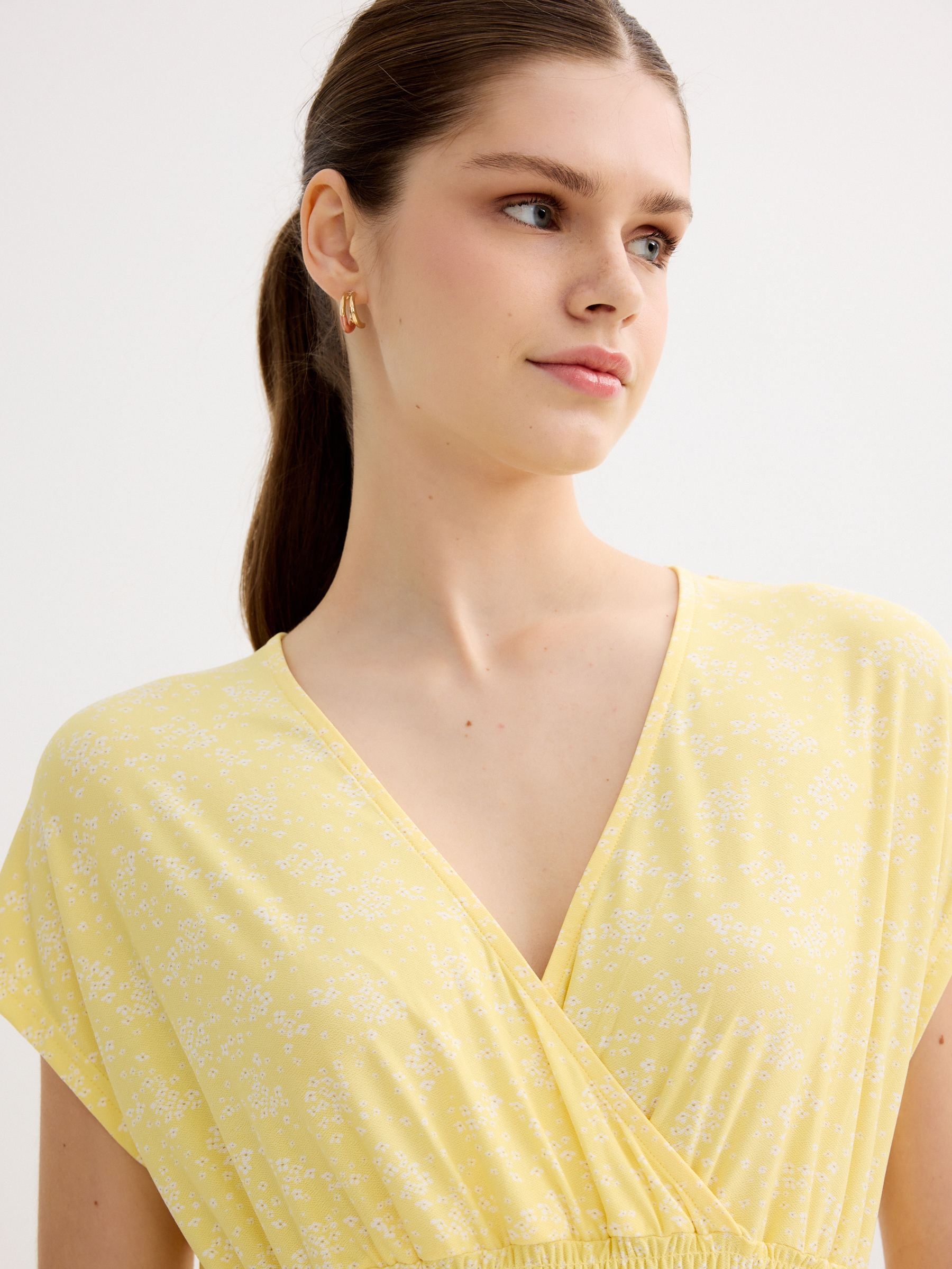 midi floral dress with smocked bodice yellow middle front view