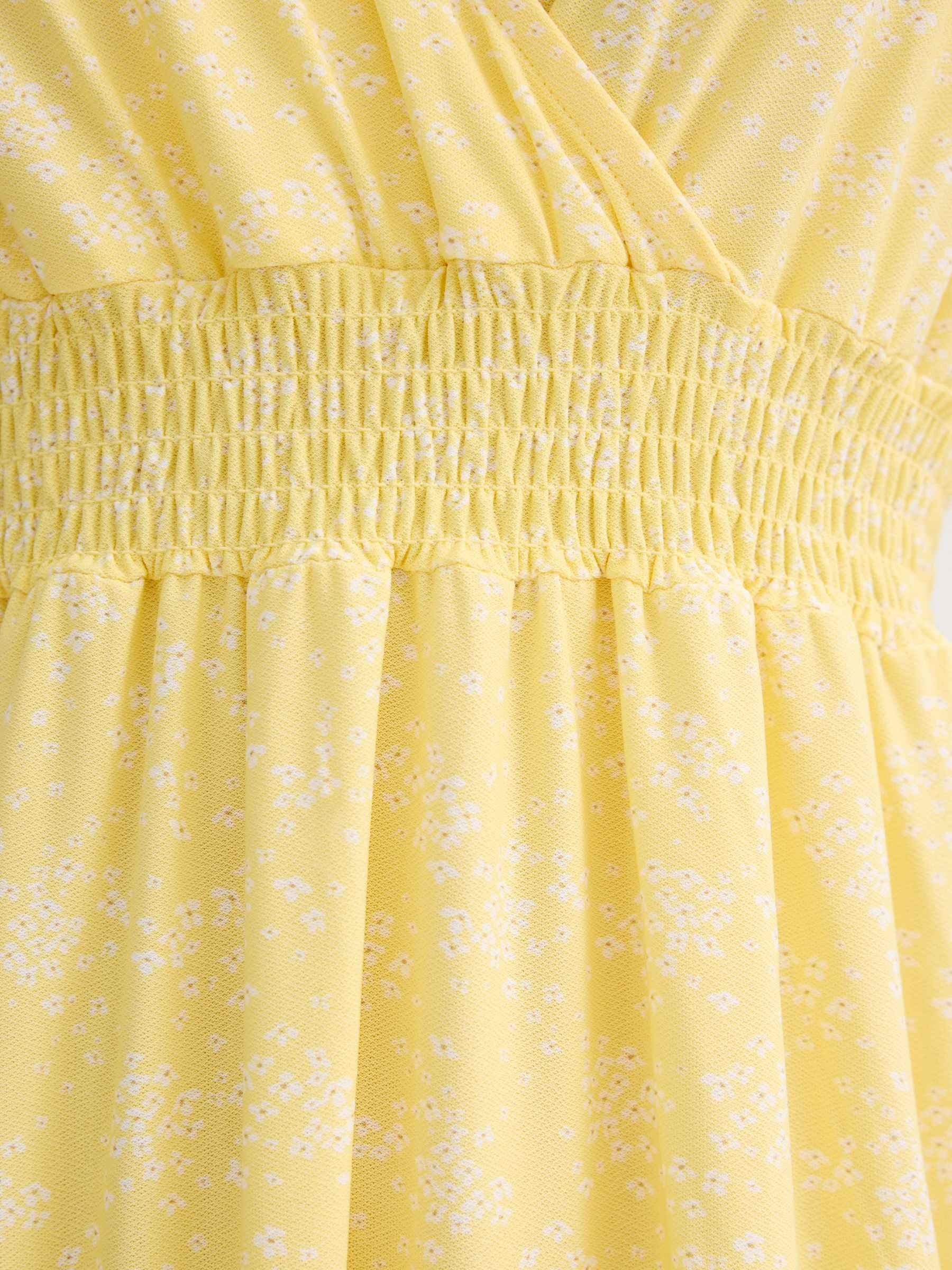 Vestido midi flores nido abeja amarillo vista media frontal