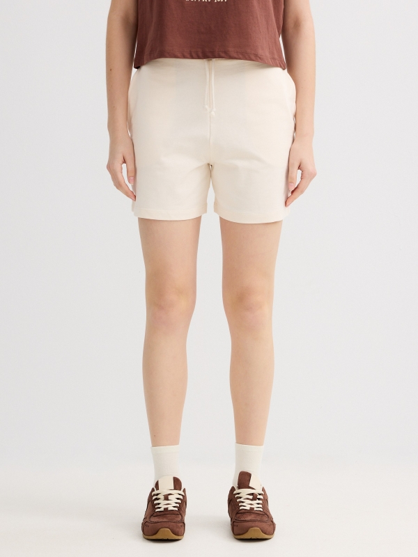 High-waisted fleece Bermuda shorts raw middle back view