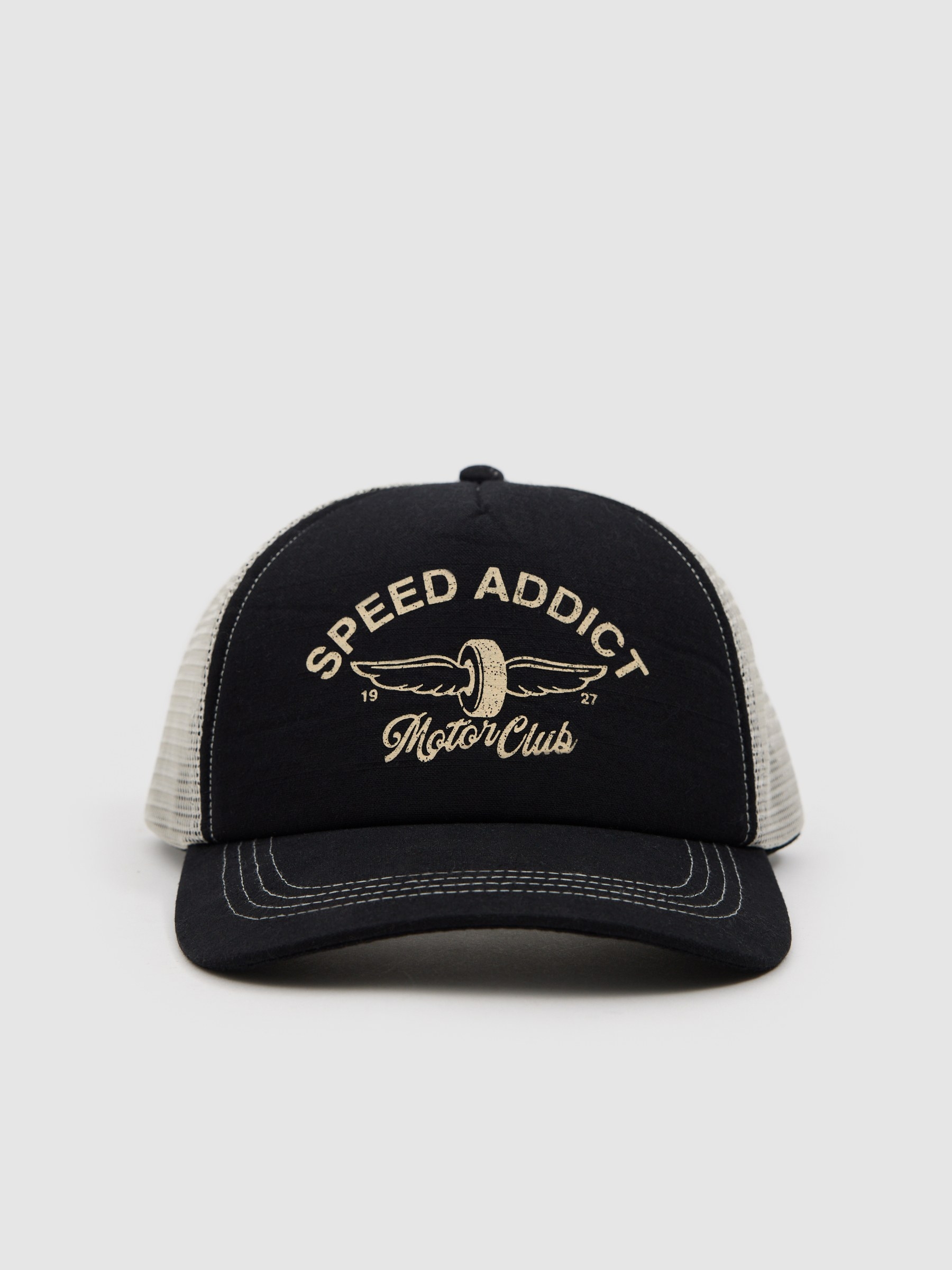Gorra trucker estampada speed addict beige vista lateral frontal 45º
