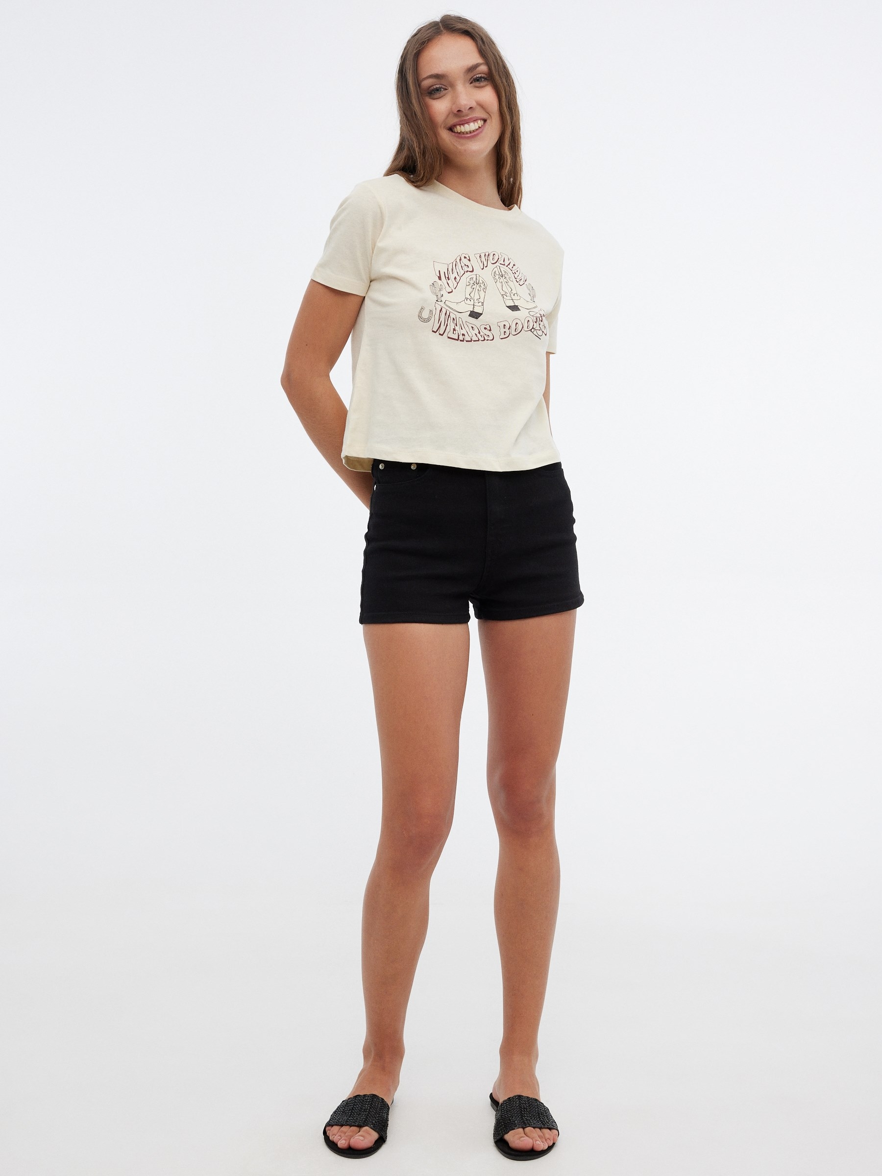 Wears Boots T-shirt sand middle front view
