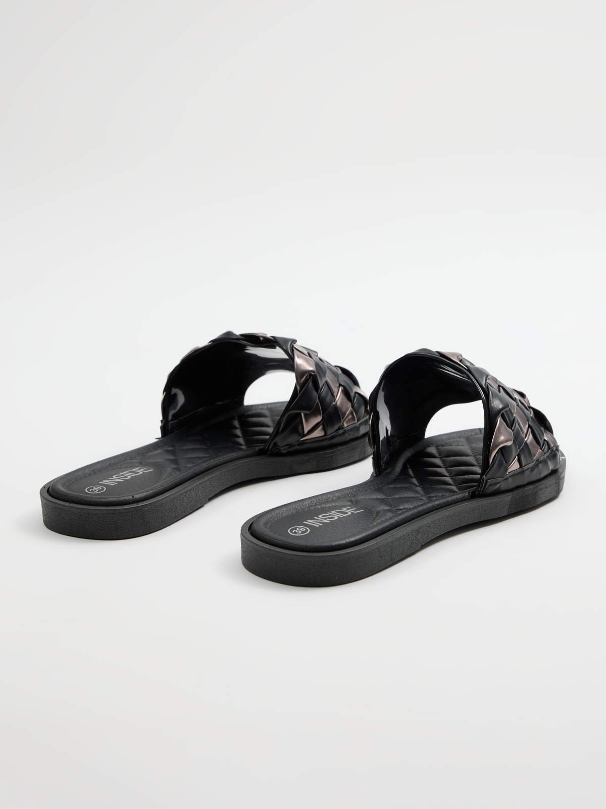 Cushioned braided shovel sandal black 45º back view