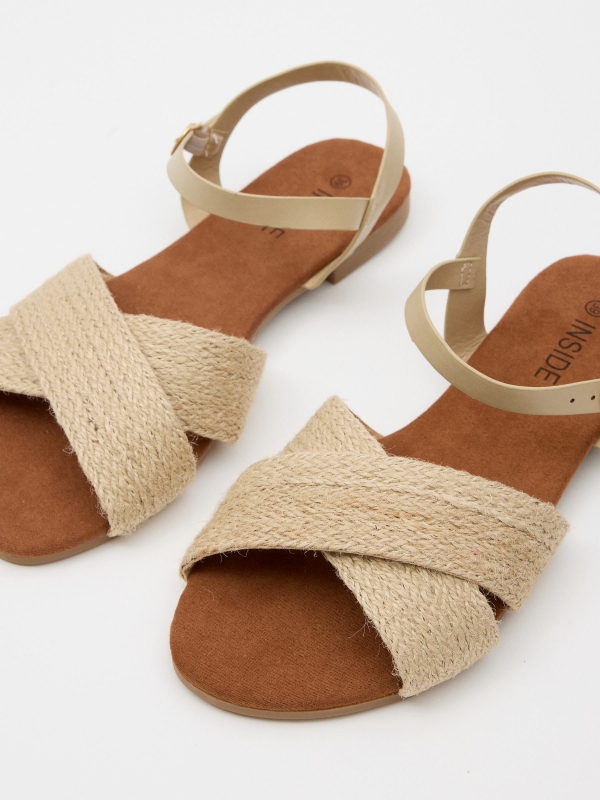 Natural jute crossed sandal sand detail view