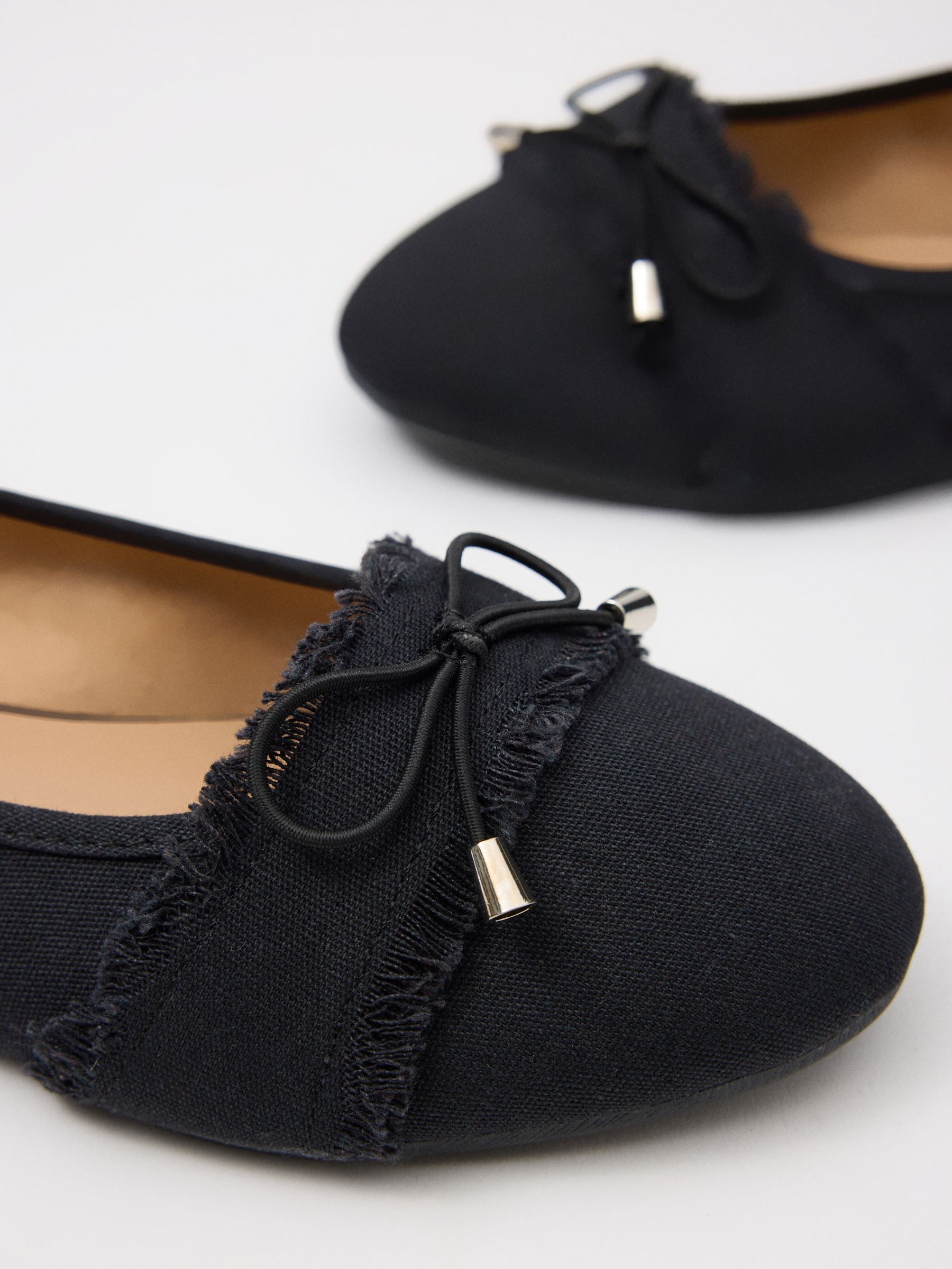 Bailarina de lona con lazo negro