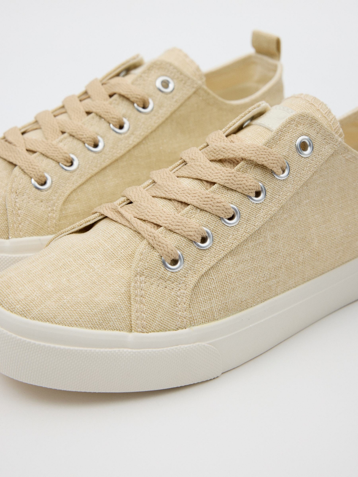Basic casual canvas sneaker sand detail view