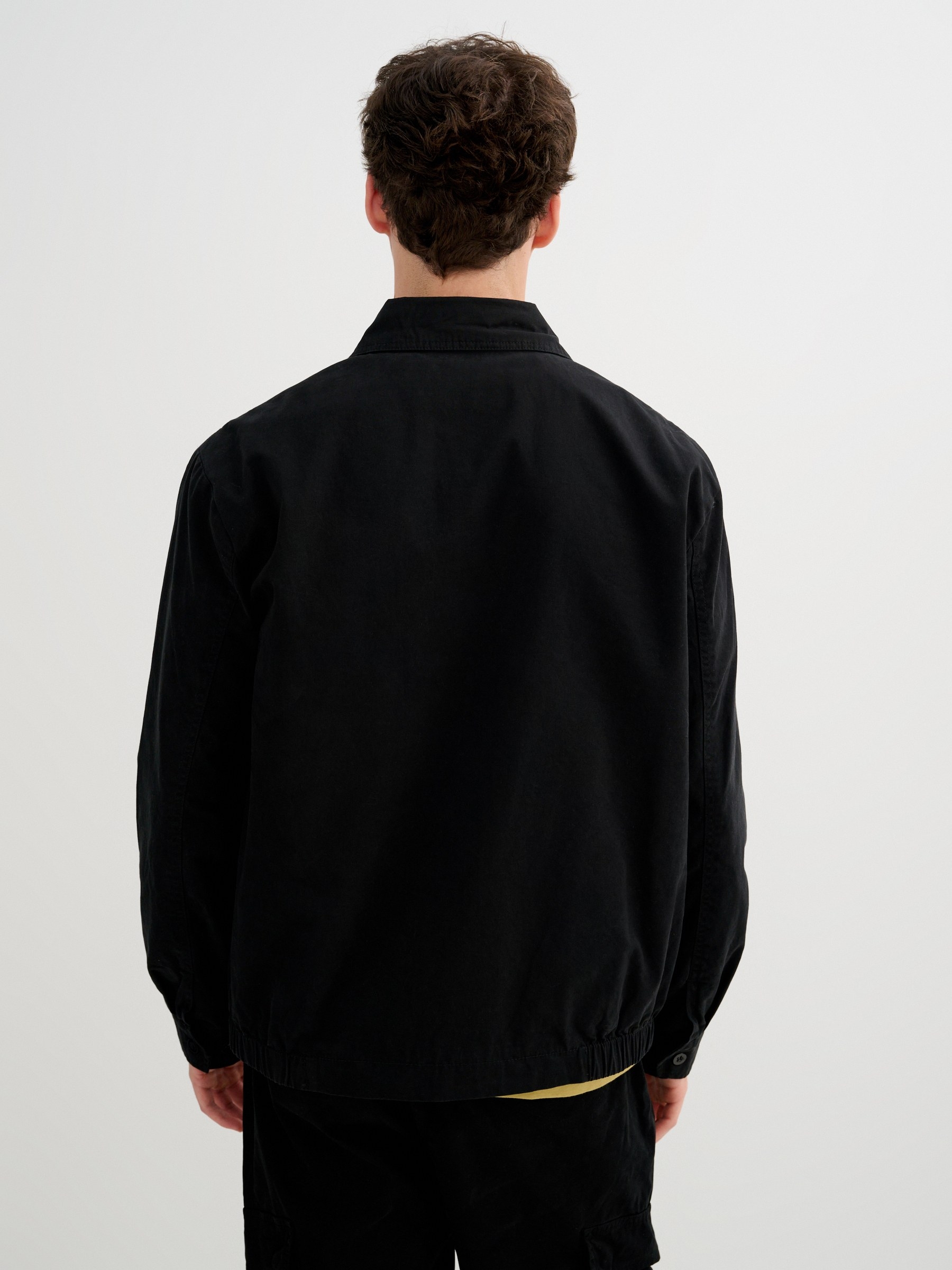 Plain jacket with zipper black middle front view