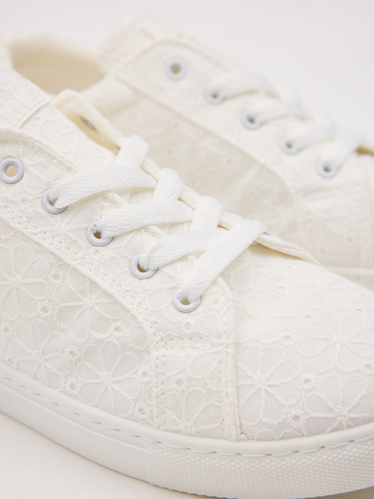 Embroidered canvas platform sneaker white detail view