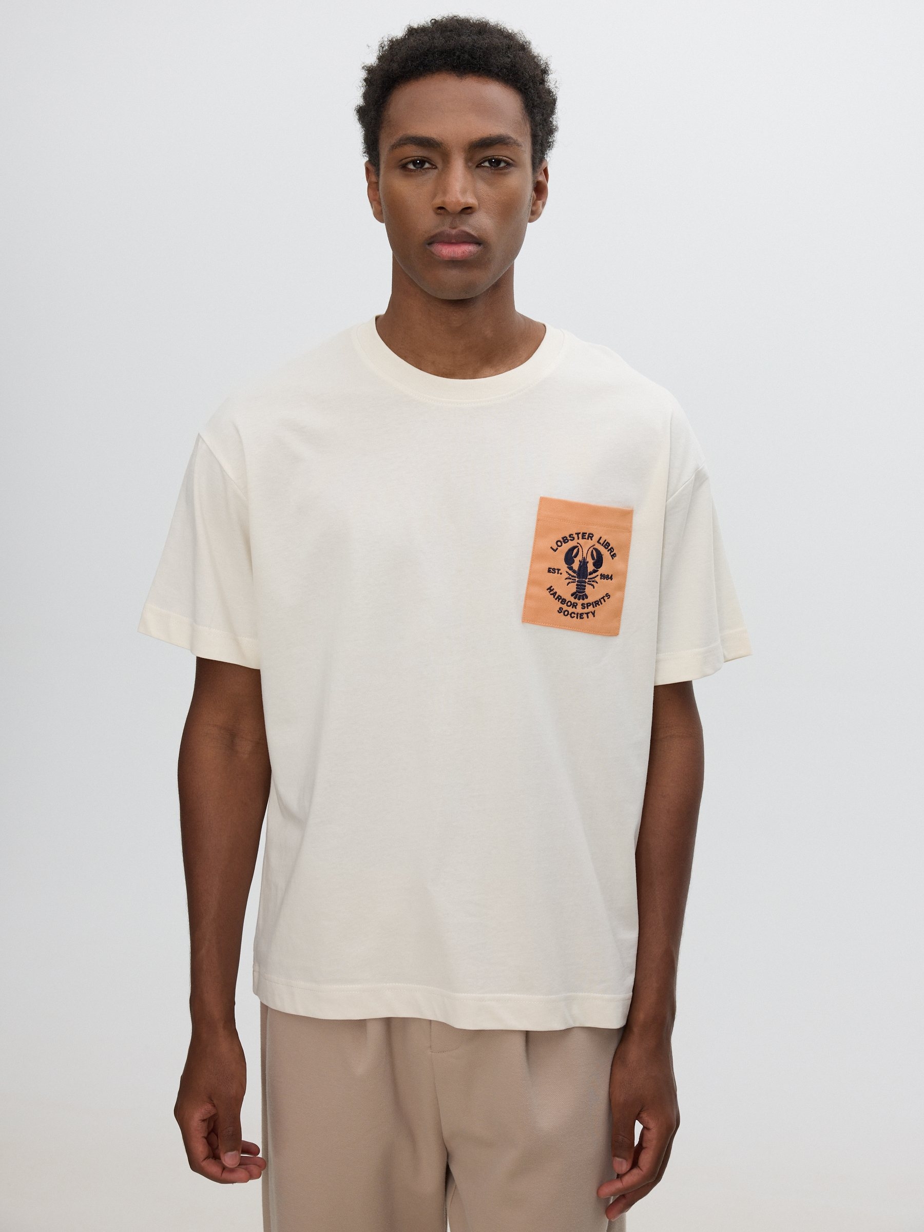 Printed pocket T-shirt raw middle front view