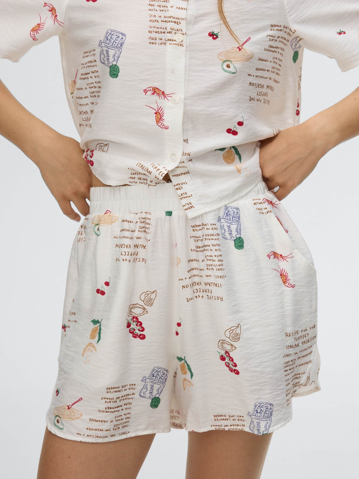 flowy printed Bermuda shorts white middle back view