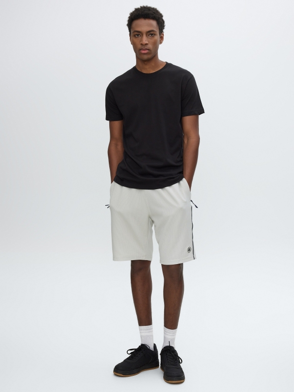 Bermuda jogger felpa con cordones gris claro vista media frontal