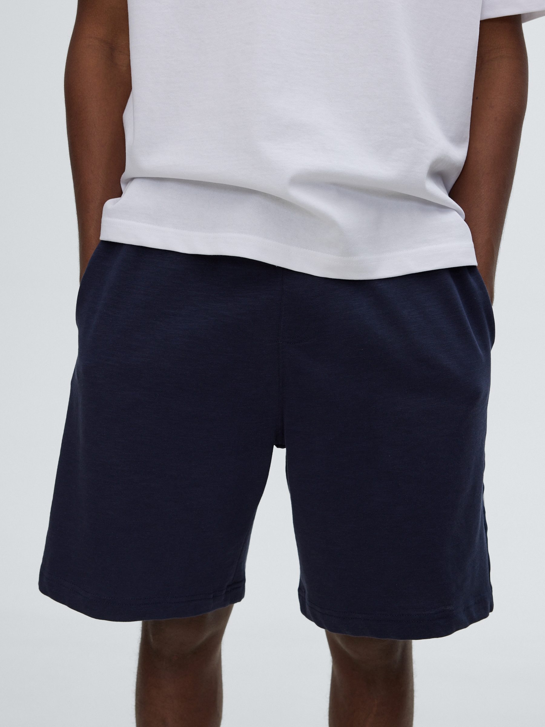 Bermuda jogger with side stripes navy middle front view
