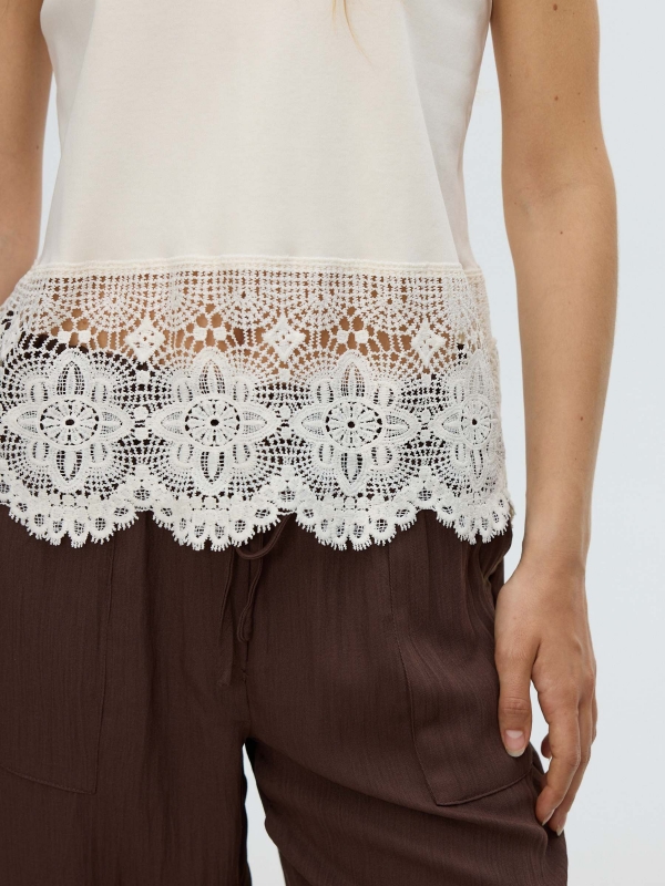 Sleeveless embroidered T-shirt off white detail view