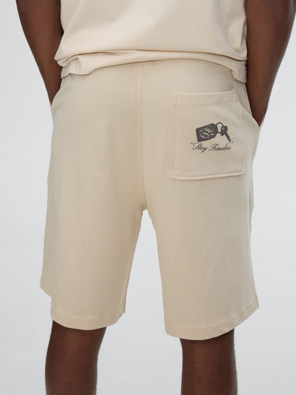 Bermuda jogger felpa crudo vista general frontal