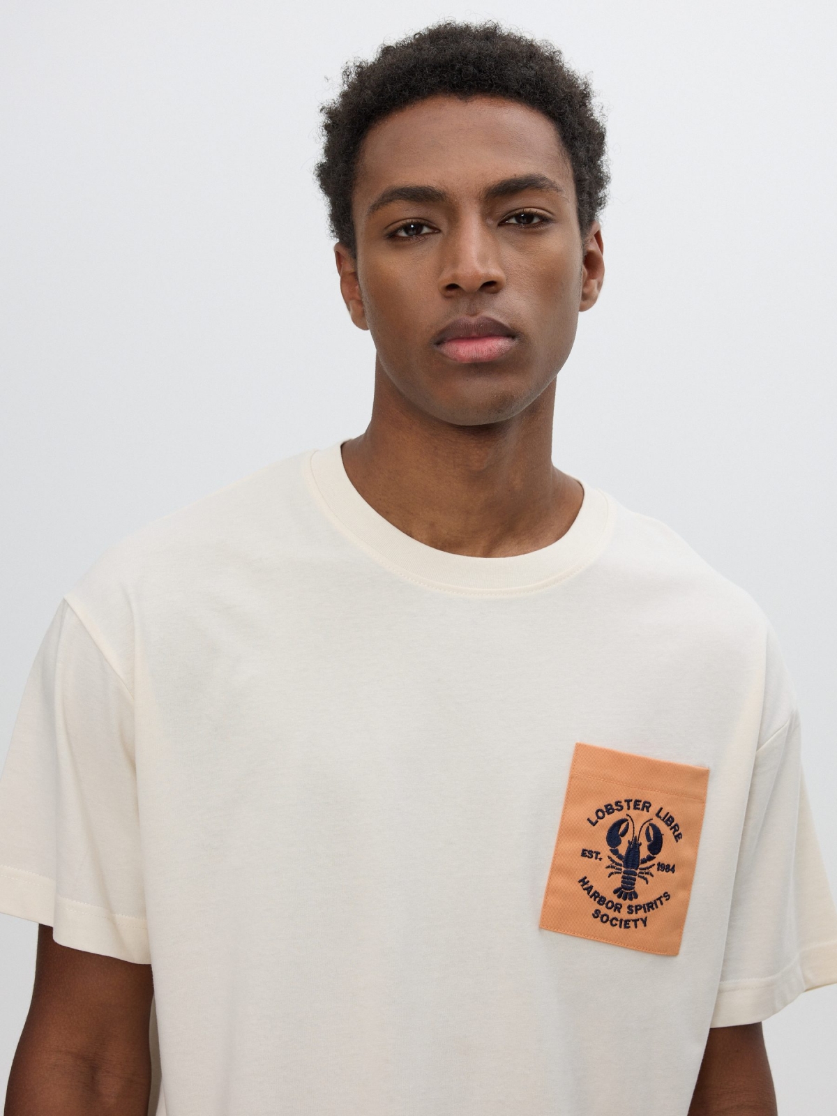 Printed pocket T-shirt raw detail view