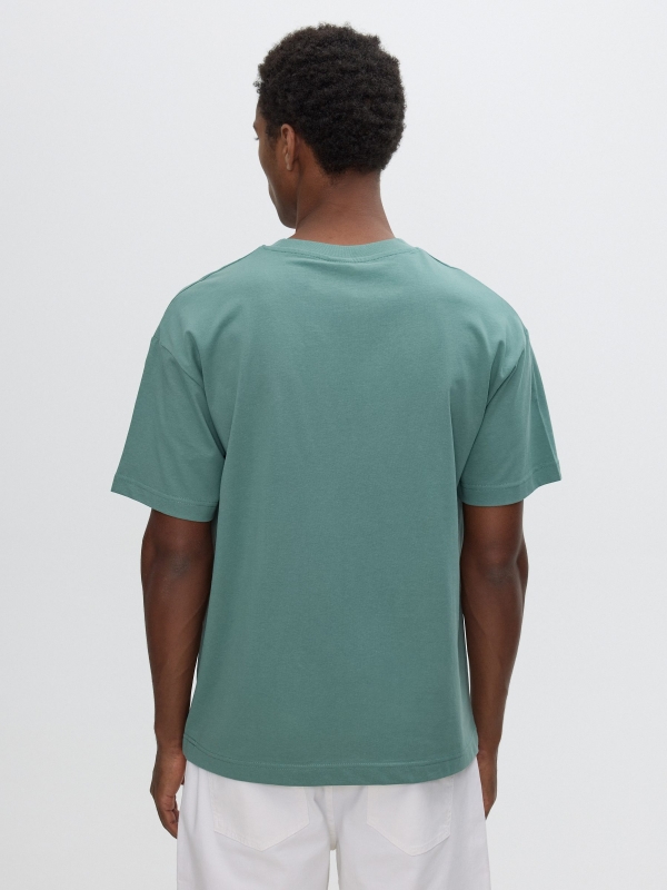 Camiseta bolsillo estampado verde vista media trasera