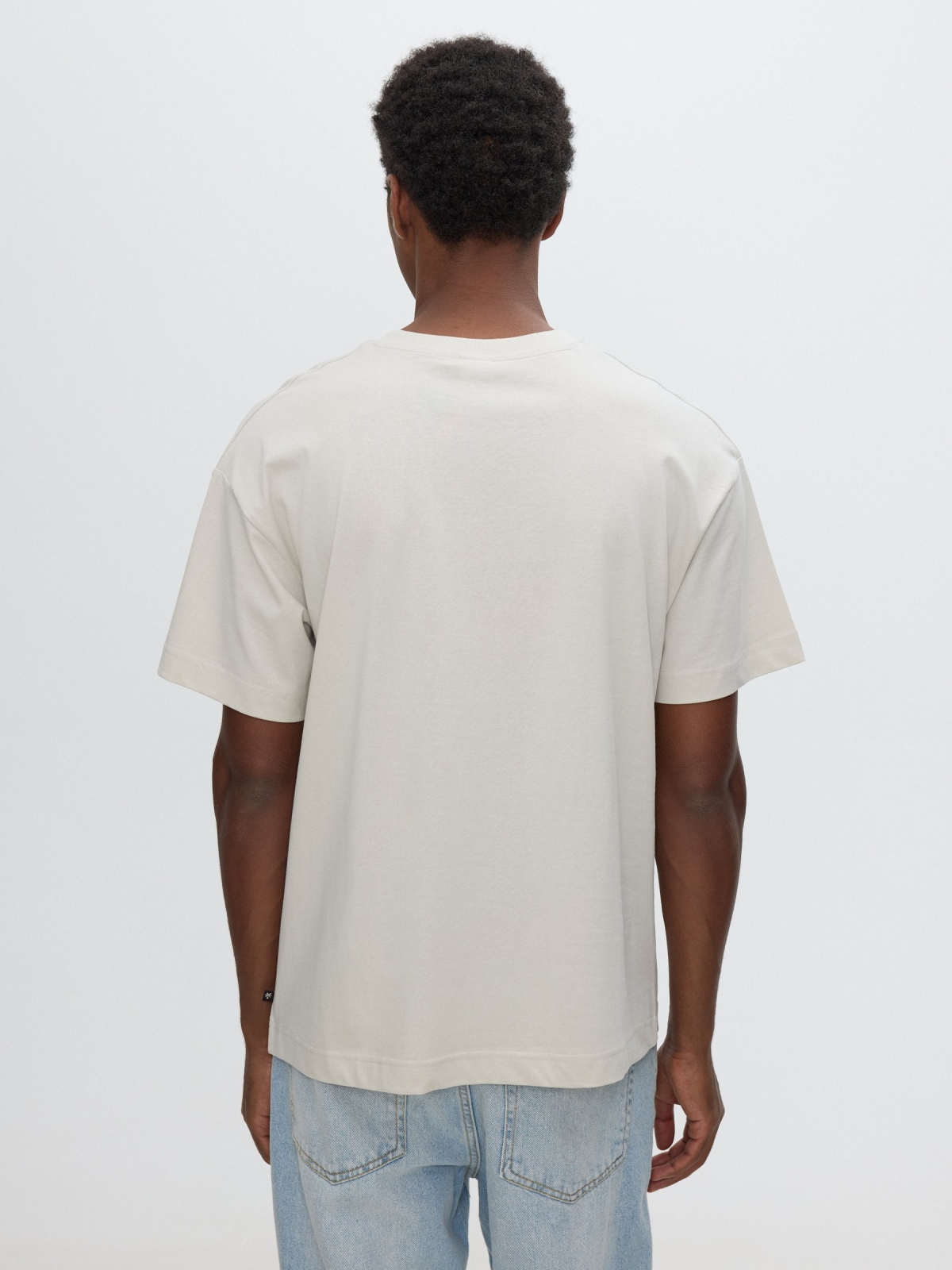 Camiseta texto ocean voyage cinza claro vista meia traseira