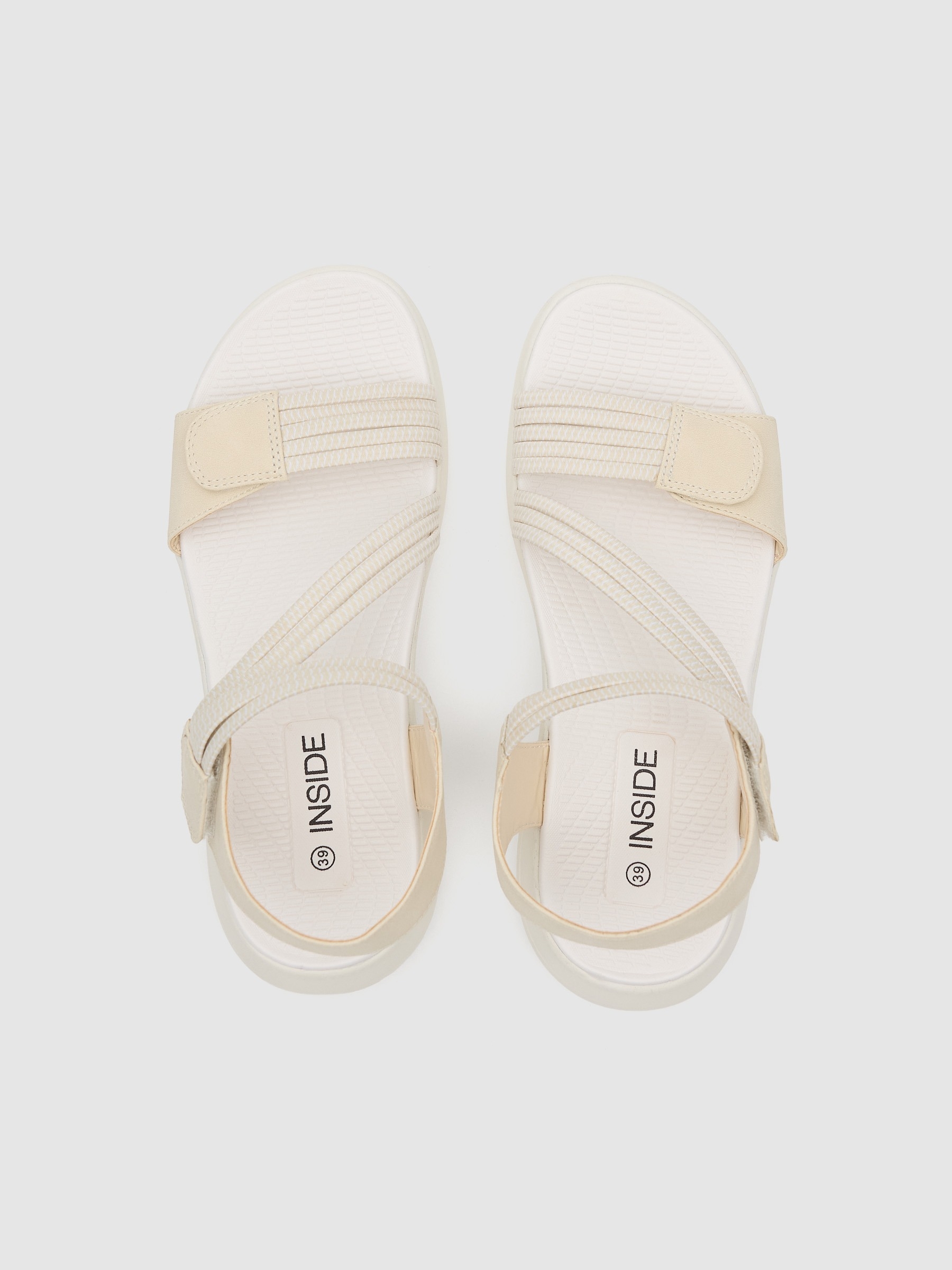 Crossed faux leather sandal with velcro beige