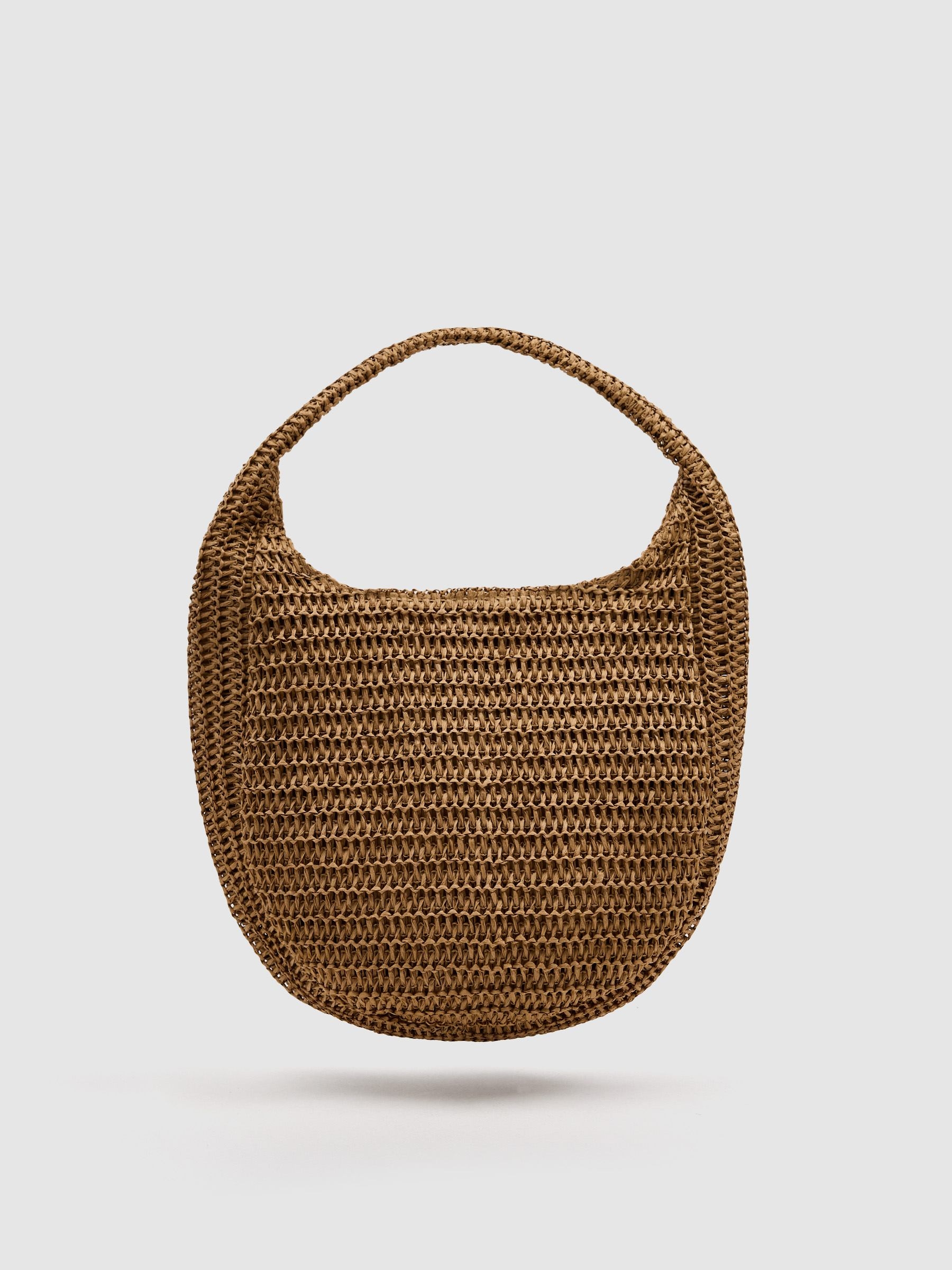 Bolsa de ombro de ráfia trançada