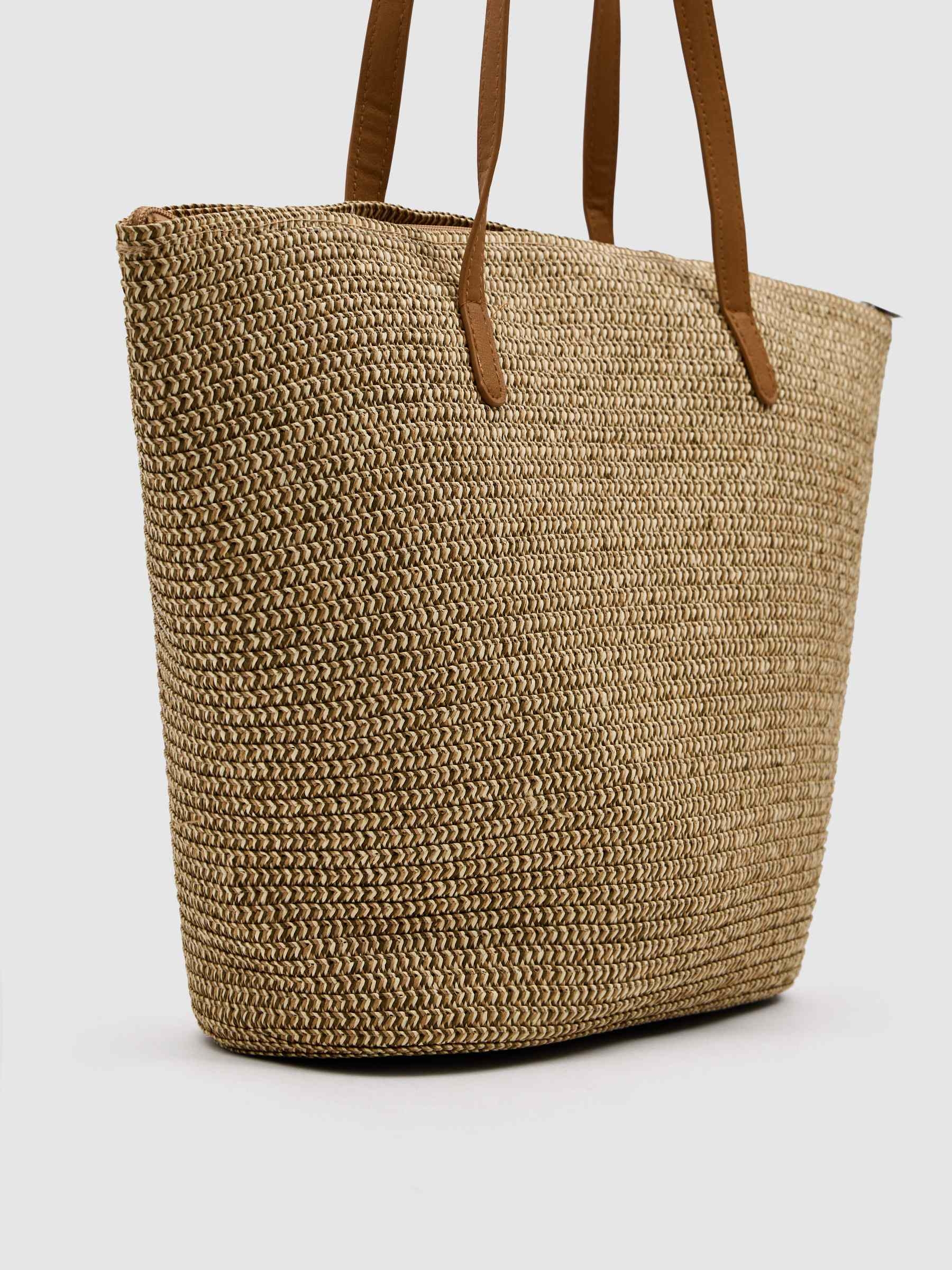 Raffia basket brown front view