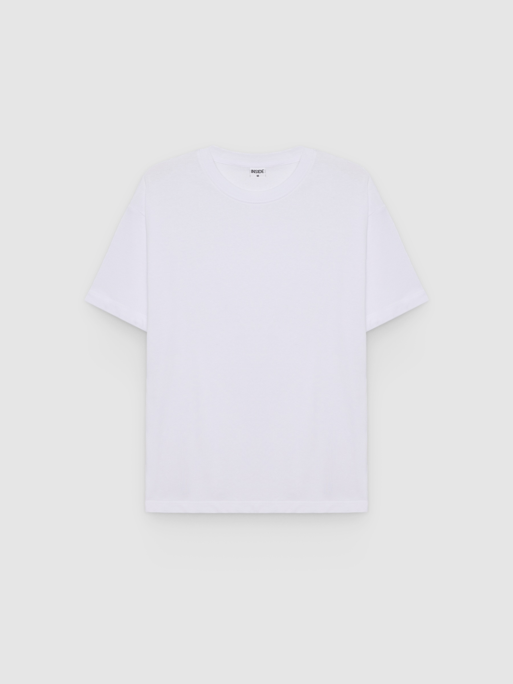Camiseta lisa de cuello redondo blanco vista media frontal