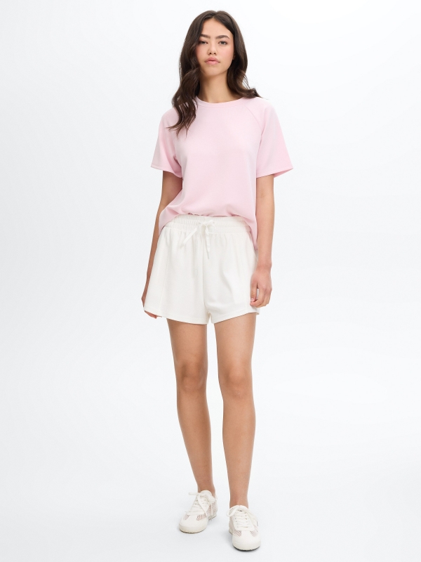 Short fluido soft bolsos branco vista meia frontal