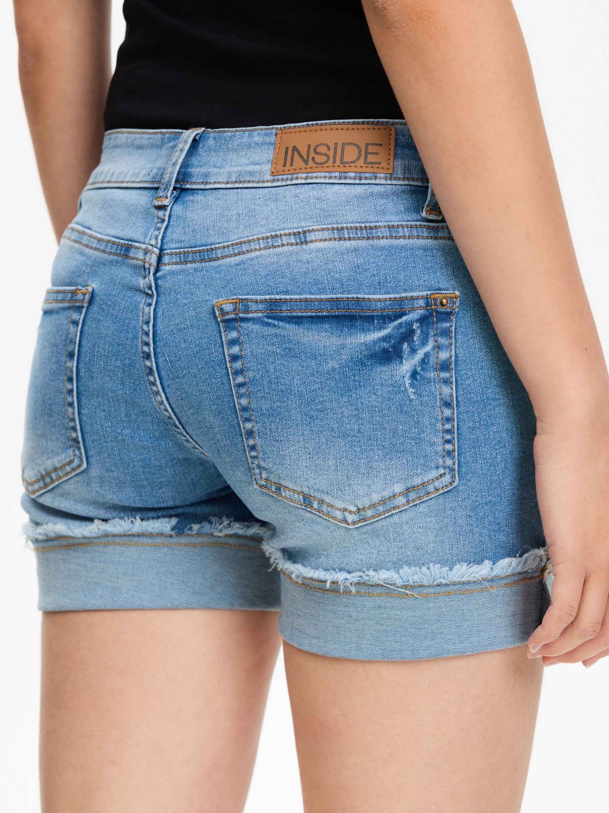 Frayed hem denim shorts blue detail view
