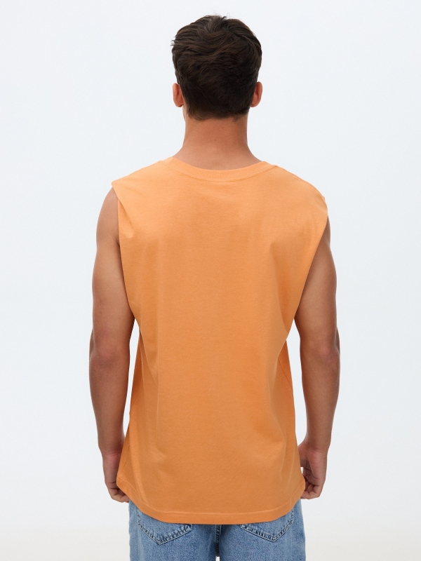 Camiseta básica sin mangas coral vista media trasera