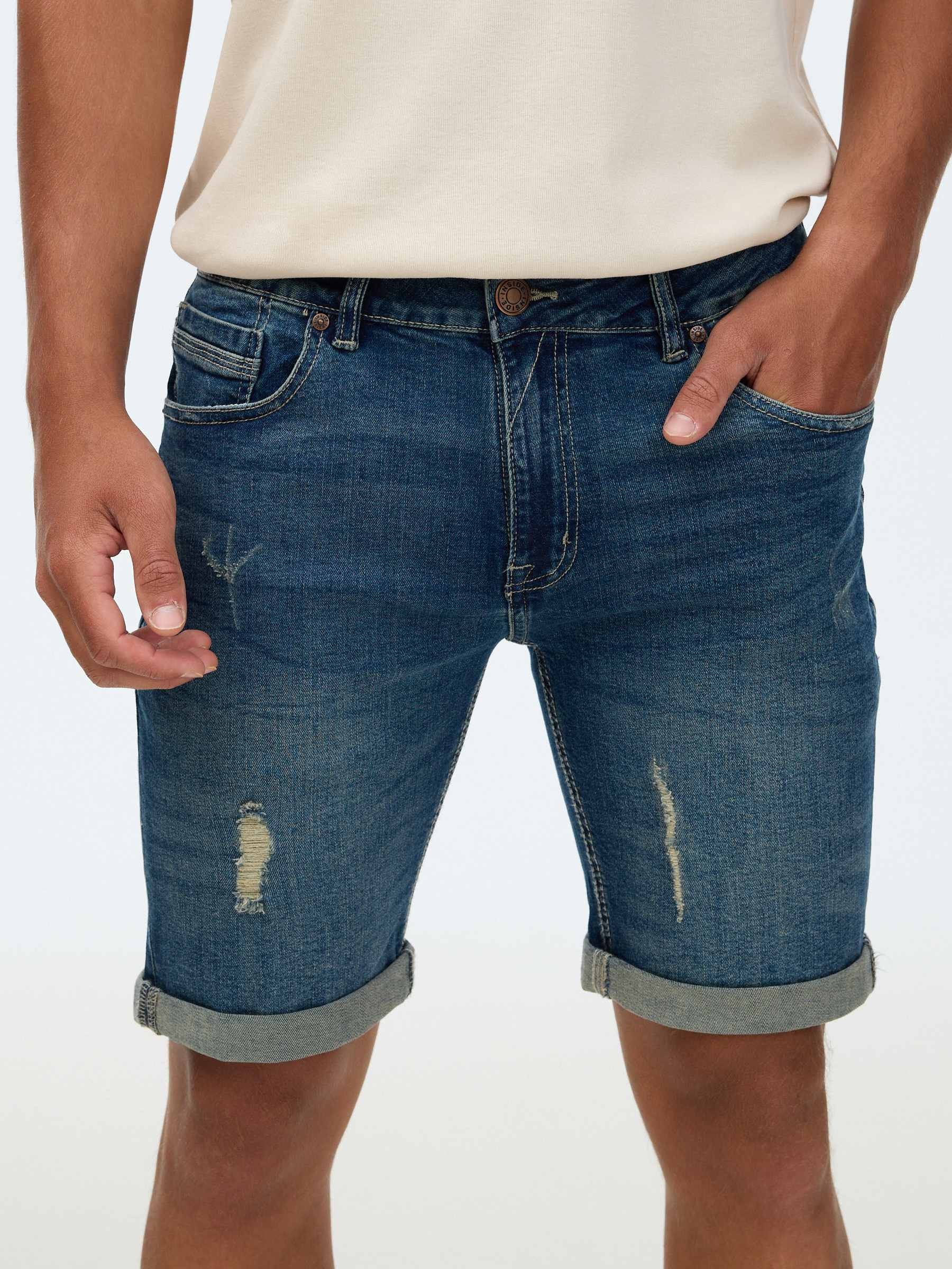 Calça jeans skinny azul vista meia frontal