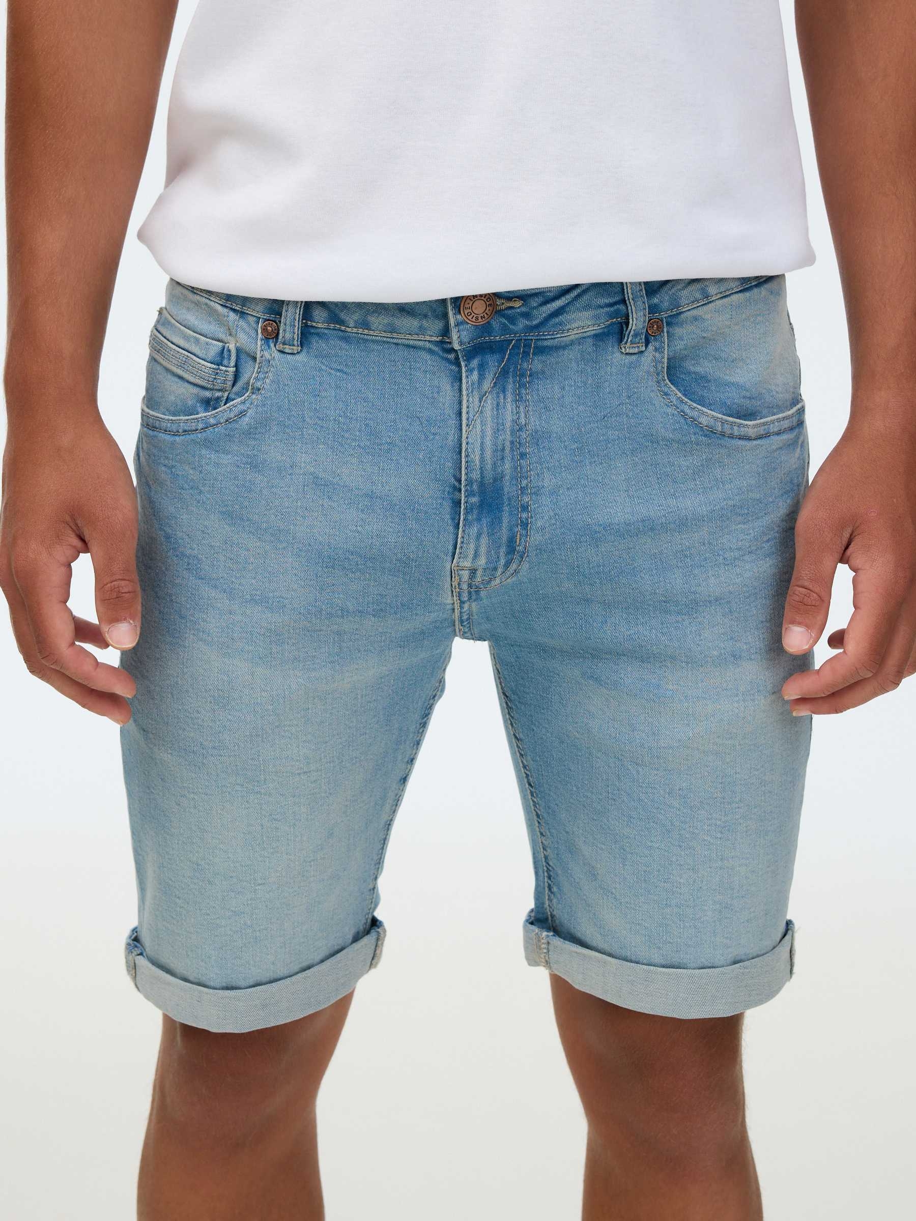 Five-pocket denim Bermuda shorts blue middle front view