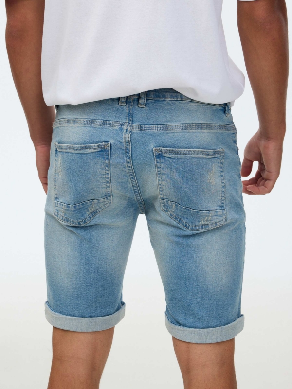 Five-pocket denim Bermuda shorts blue front view