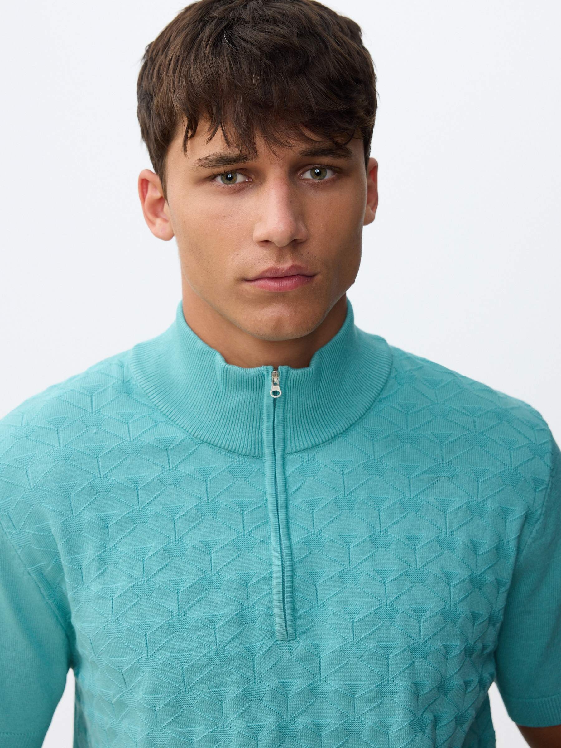 Knit turtleneck T-shirt green middle front view