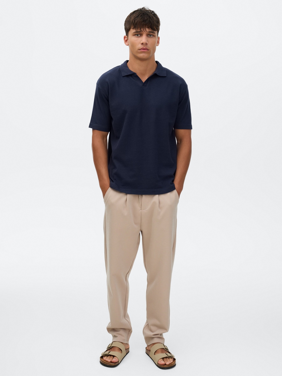 Plain short-sleeved polo shirt navy front view