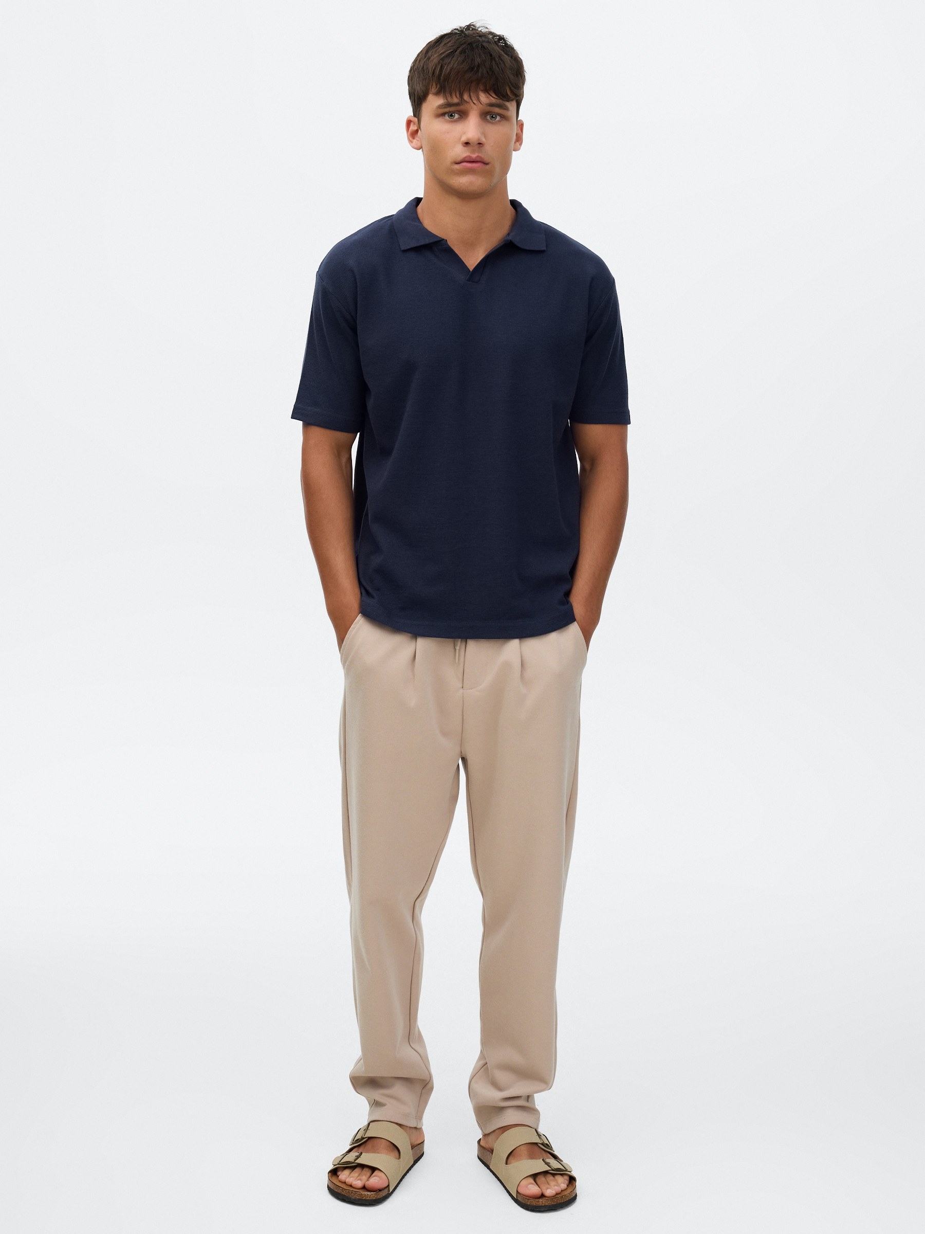 Plain short-sleeved polo shirt navy middle front view