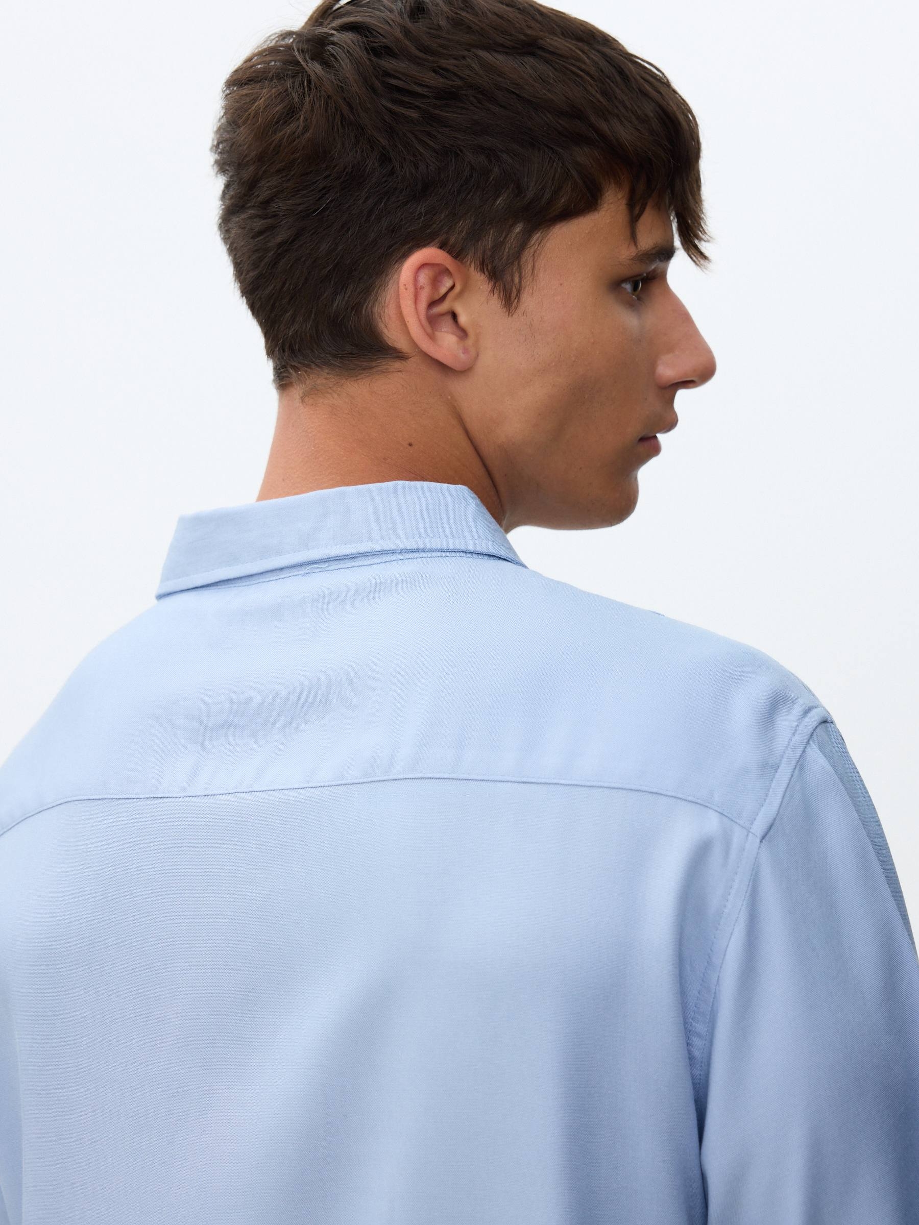 Short-sleeve linen shirt sky blue middle front view