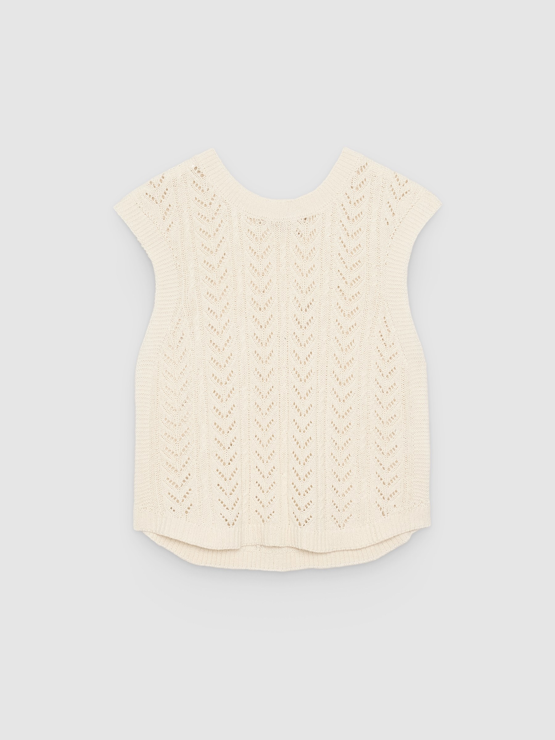 Top calado sin mangas beige vista media frontal