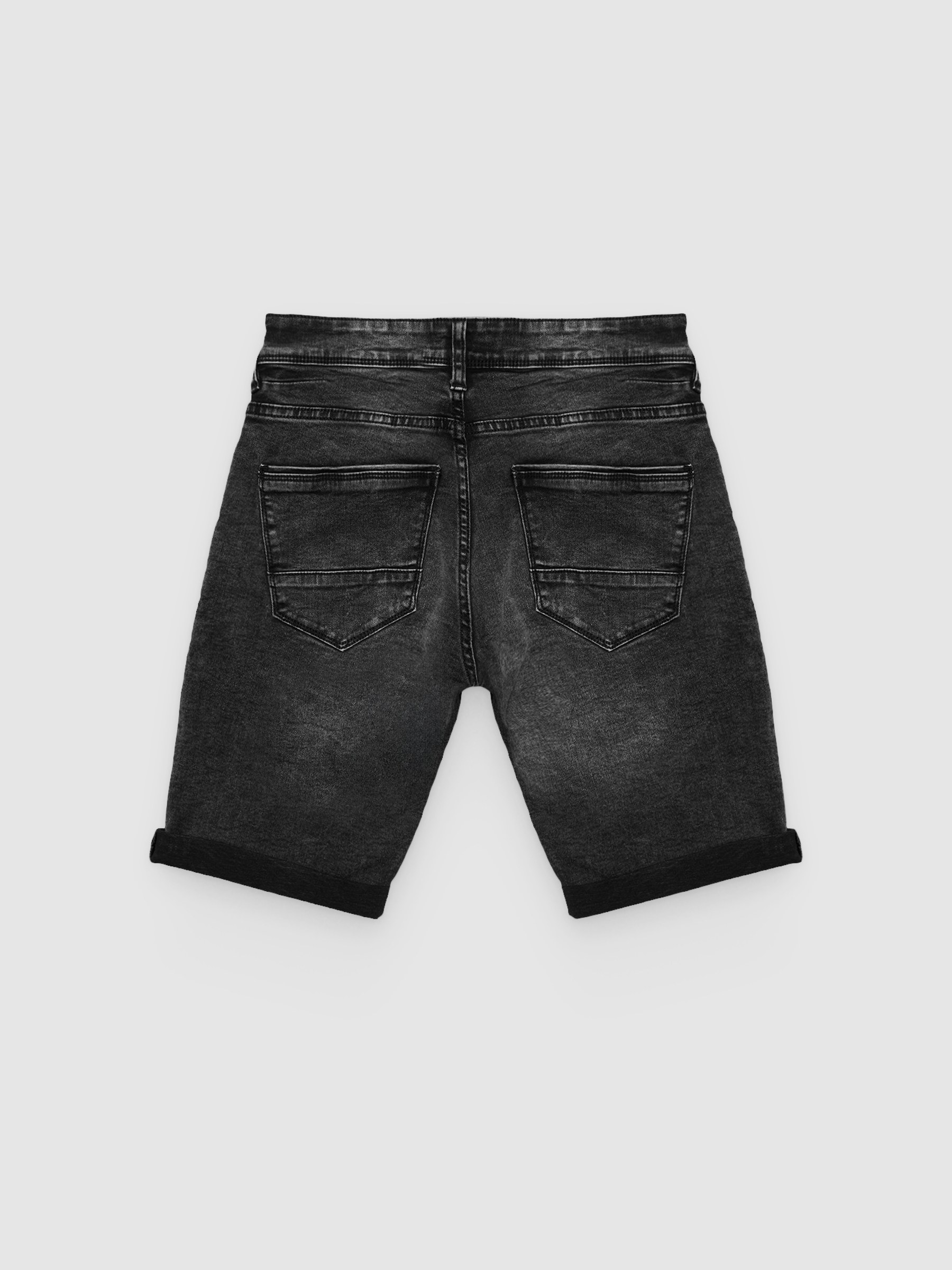 Bermuda vaquera skinny con rotos negro vista media frontal