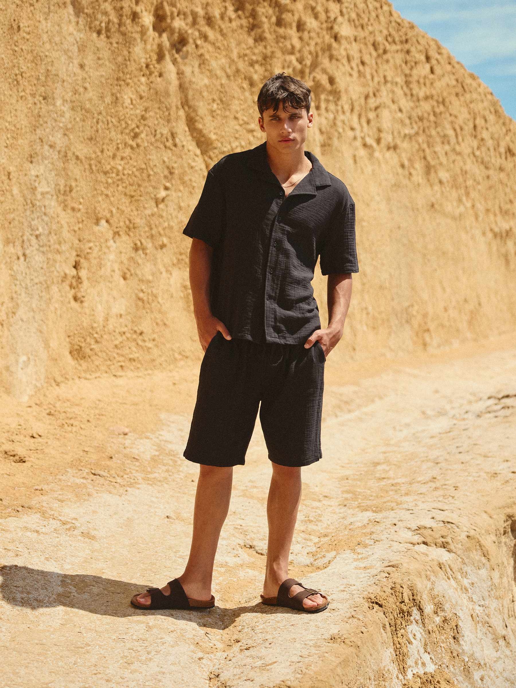 Linen cargo jogger shorts navy middle front view