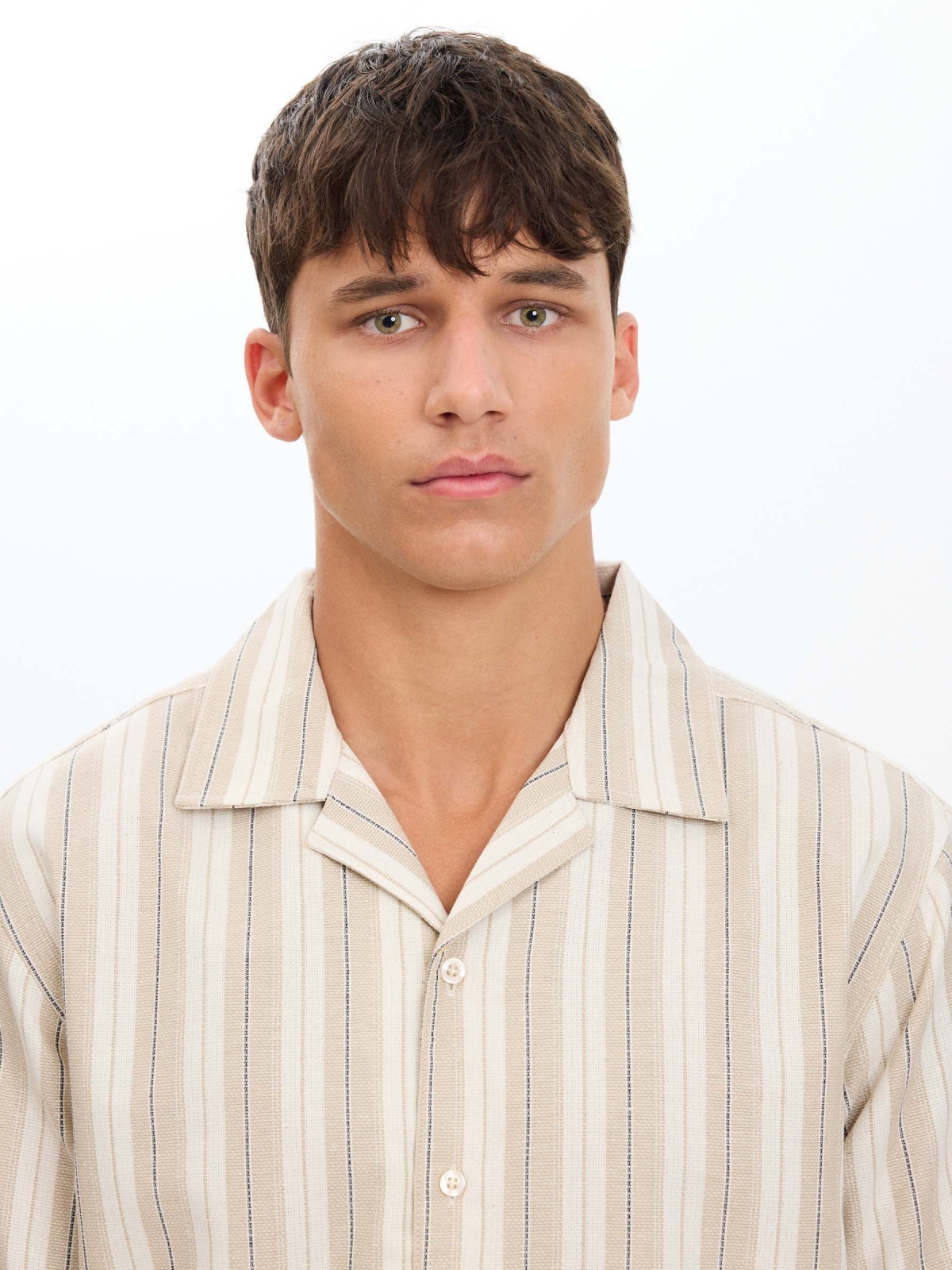 Striped knit shirt with buttons raw detail view